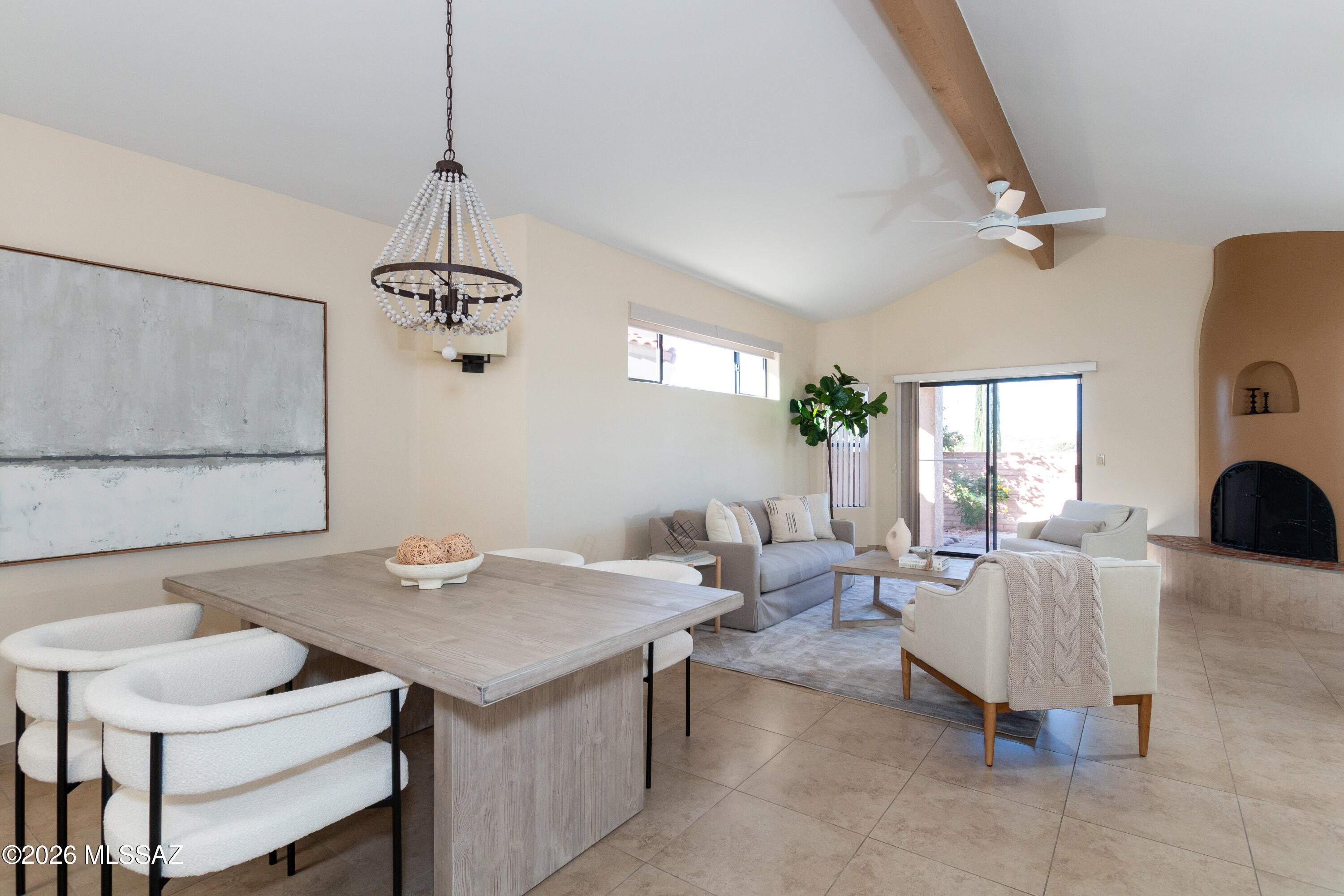 Striking Burnt Adobe home With Stunning Location that gives it All to you! Welcome to Luxury turnkey living in Oro Valley with View of the Mountains, city lights, a premium lot with no rear neighbors, and the OV golf course almost in your backyard. Arrive to a lush low maintenance front courtyard that leads you into the bright open 2bd 2ba home with high vaulted ceilings and plenty of natural light. For golf lovers this property is just a short distance to OV Country Club, shopping, dining, and OV hospital. The home features New Upgraded kitchen with granite countertops, all stainless-steel appliances, white Cabinet, stylish pulls, and tile floors throughout. The backyard space will please you with again the lush low maintenance landscaping and Large covered patio making it ready for you to just step out to enjoy the beautiful morning or tranquil evening. This is the perfect part/time property or year-round. Plus, you get the Bonus of the Amazing community pool/spa and clubhouse. Do not miss out on this fabulous opportunity!