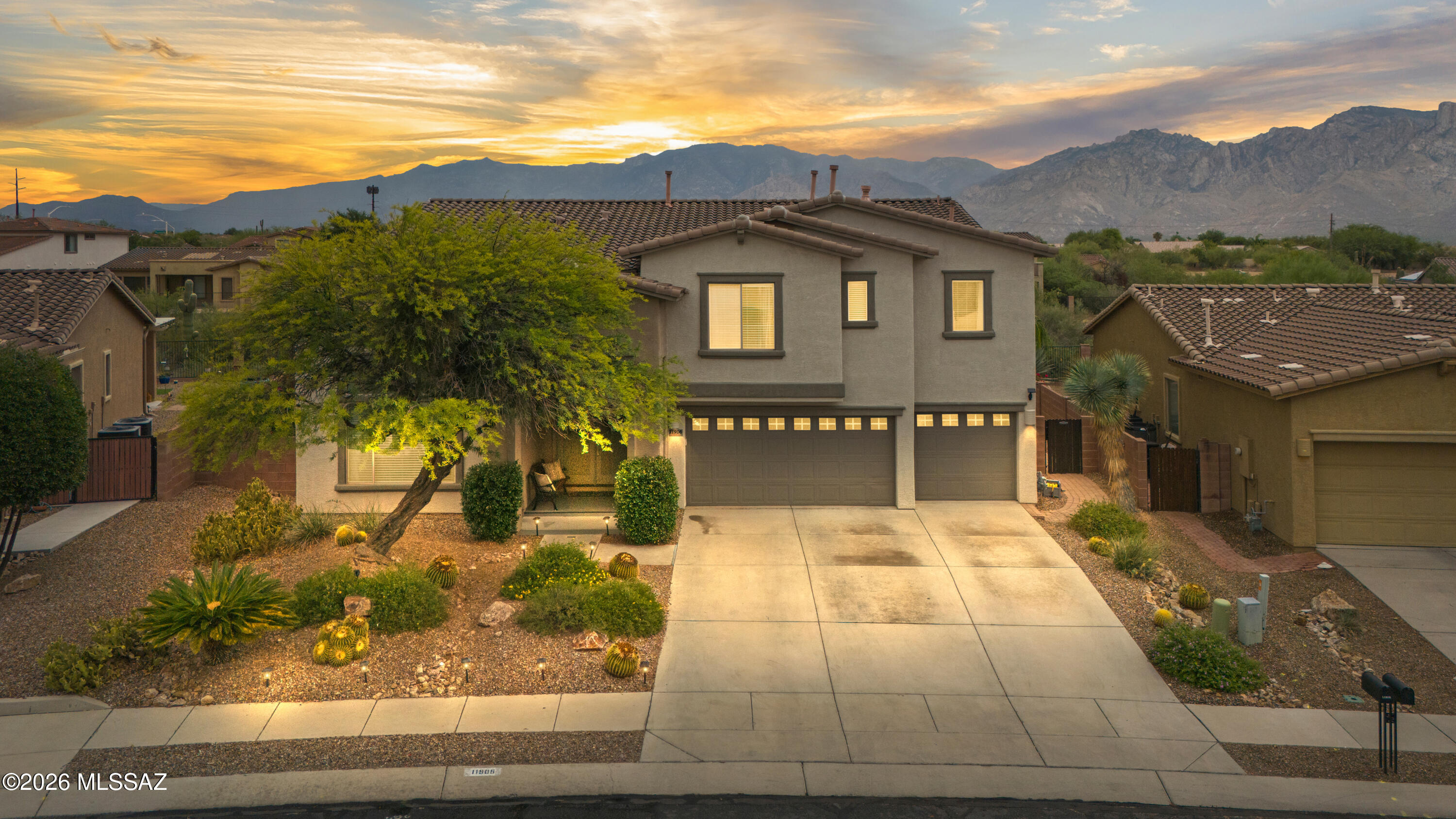 Experience refined desert living in this stunning 4,581-square-foot Oro Valley residence, ideally situated against a protected wash for exceptional privacy. Designed for effortless entertaining, the home features soaring foyer ceilings, a grand living room, and a newly updated chef's kitchen with quartz countertops and premium stainless steel appliances. The open Great Room showcases a gas fireplace and wet bar, while upstairs offers a spacious bonus/media room and expansive balcony with breathtaking mountain views. The luxurious owner's suite includes dual walk-in closets, split vanities, and a soaking tub. Outside, enjoy a resort-style backyard with a heated PebbleTec pool, waterfall, and abundant afternoon shade. Schedule your private showing today & see it for yourself!