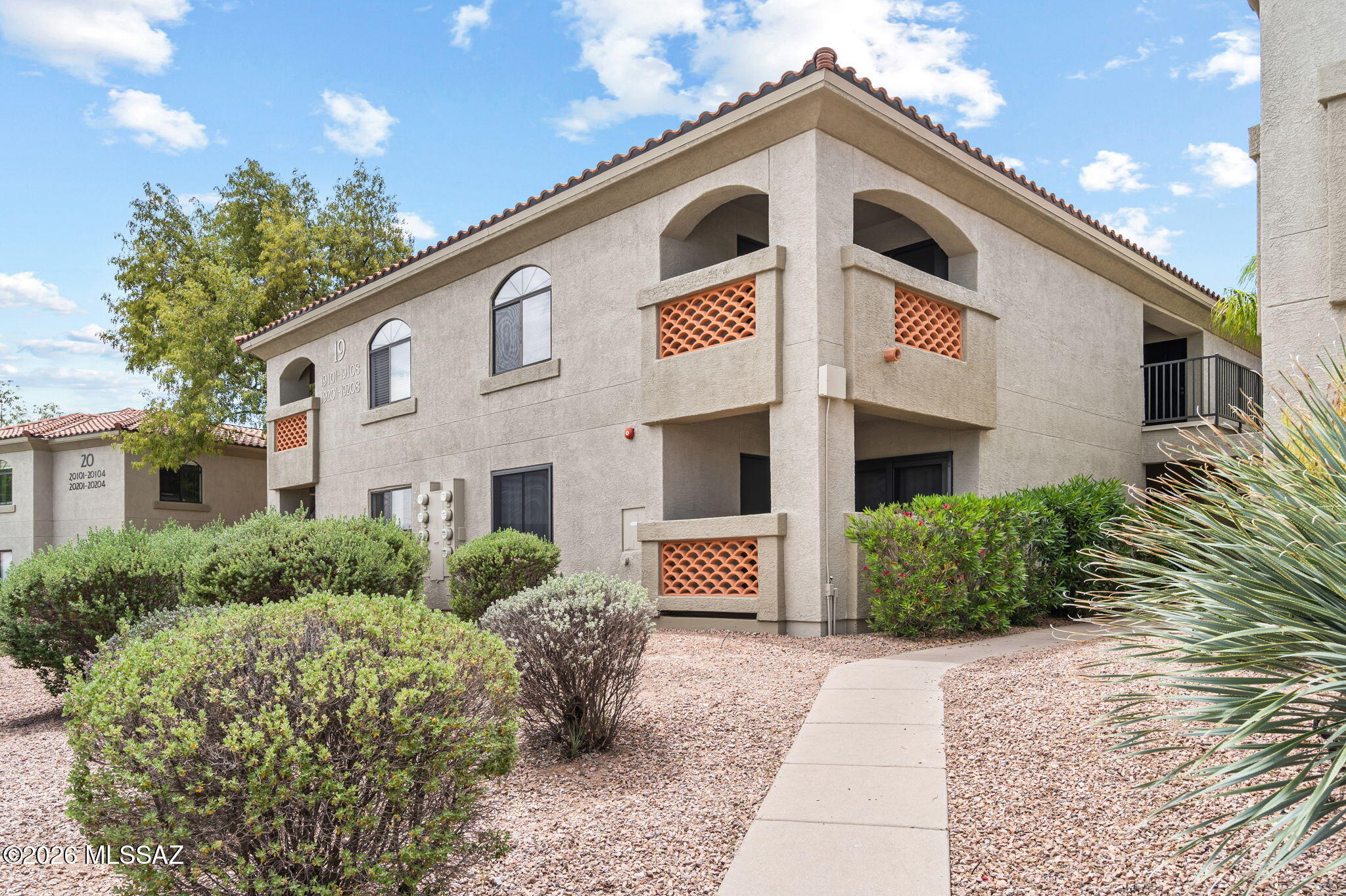 2nd floor unit, fresh paint and new flooring. Excellent use of square footage, covered balcony with storage and mountain views, walk in pantry, large linen closet, fridge, washer/dryer, dishwasher, community pool, fitness center, 24-hour gated community and clubhouse.