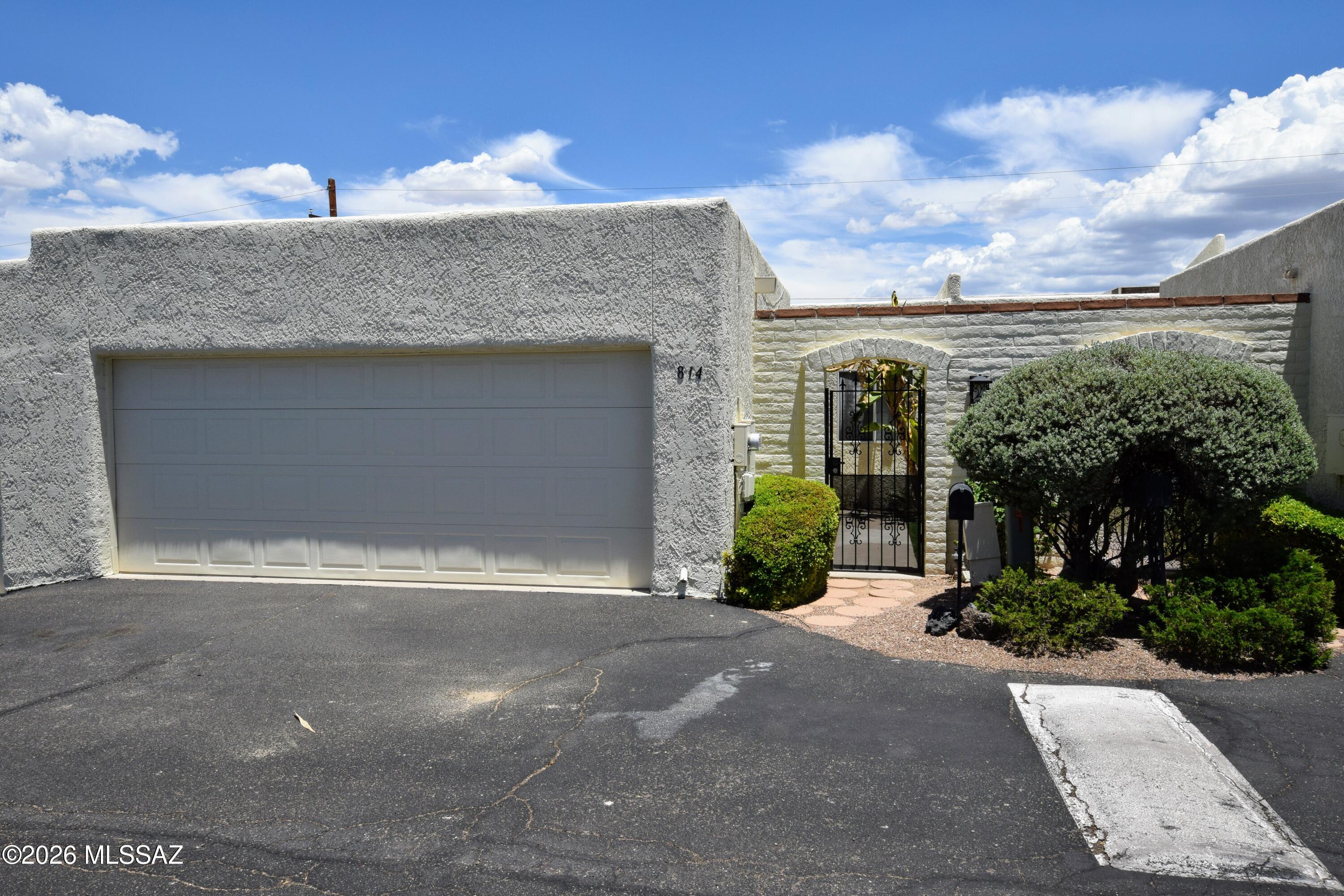 Eastern Heights Village 2 Bed 2 Bath Townhome with attached 2 Car Garage. Tile throughout. NO CARPET. The eat-in kitchen has granite counters, stainless steel appliances, and lots of cabinet and counter space to work with. Open living area with plenty of room for large pieces of furniture. Guest Bath has a tile tub surround and jetted tub. The spacious primary suite has dual closets (one is a walk-in) and a large walk-in shower. Covered patio with views to the east. Full-size indoor washer/dryer. The garage has some built-in storage and shelf space. The community pool is just steps away. This home is offered as NON-SMOKING. Pets are subject to owner approval.
