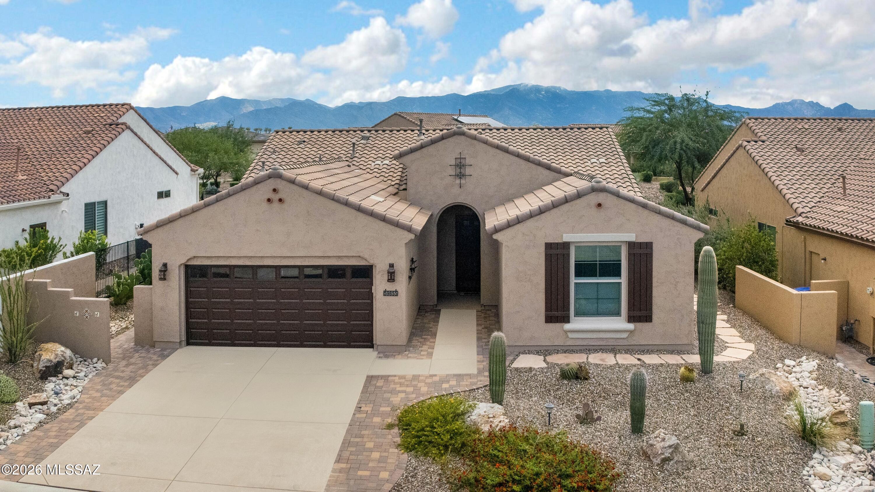 Beautiful 2019 Hermosa located in SaddleBrooke Ranch with Great Curb Appeal! Foyer opens to Great Room & desirable open-concept floor plan. Kitchen features Quartz Counters, Stainless Steel Appliances (3 out of 4 are Bosch), Island, & Pantry with Slide-Outs. Dining Area offers easy access thru slider to outdoor living spaces. Owner's Suite has Ensuite Bath with Quartz Counter, Dual Vanity, Walk-In Shower & Walk-In Closet. Den/Office. Guest Bedroom with closet. Guest Bath nearby featuring a Walk-In Shower. Laundry Room includes W/D. Extended 2-Car Garage offers Water Softener System, Utility Sink & Hanging Storage Rack. Relax or entertain in the Screen-Covered Patio, then step out to the Extended Paver Patio with Pergola. Lovely Landscaping complements a backyard full of possibilities!