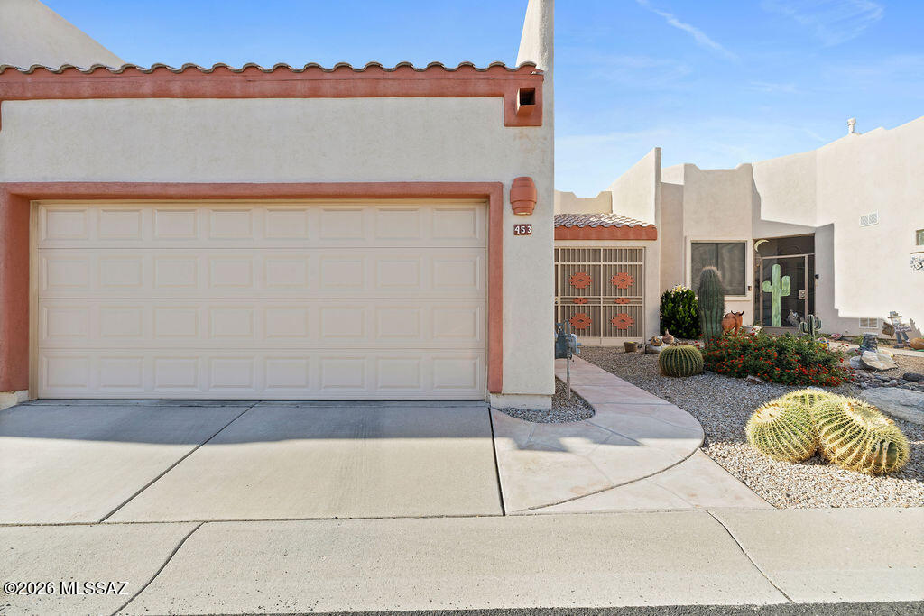 Charming and meticulously maintained 2-bedroom, 2-bath townhome in desirable Canyon View Estates, offering resort-style amenities and convenient access to shopping and dining. The open living and dining area features a cozy gas fireplace and flows seamlessly to a screened-in patio--perfect for enjoying indoor-outdoor living with mountain views.  These views also are shared with master suite. Enjoy an enclosed wrought-iron front patio, upgraded windows, ceiling fans, and ceramic tile throughout. The backyard showcases a brick patio pavers with breathtaking mountain, sunrise, and sunset views. Community amenities include a pool and spa, expansive clubhouse with library, fitness room, large kitchen, and abundant indoor and outdoor gathering spaces for events. This home is not part of GVR.