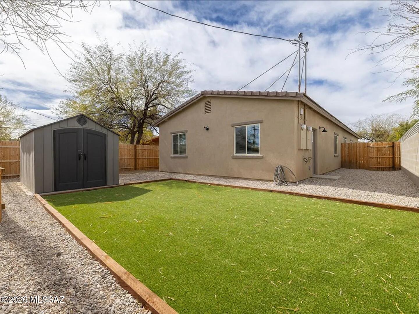 Great investment opportunity in one of Tucson's established historic neighborhoods! Built in 2024, this attached duplex offers approximately 1,882 sq ft of combined living space on a 0.18-acre lot, along with features you don't always find in multifamily properties. 

Unit 1 features 3 bedrooms and 2 bathrooms, while Unit 2 offers a bright, open-concept 2-bedroom, 1-bath layout with tile flooring throughout. Both units are separately metered and include dishwashers, washer/dryer hookups, and two dedicated parking spaces. Unit 2 also features a landscaped backyard with turf, decorative rock, and a storage shed, providing a private, low-maintenance outdoor space. Conveniently located in Barrio Hollywood, just minutes from Downtown Tucson, St. Mary's Hospital, shopping, dining, and public transportation. Whether you're looking to expand your investment portfolio or live in one unit while renting the other, this newer multifamily property offers flexibility and modern conveniences in a central Tucson location.