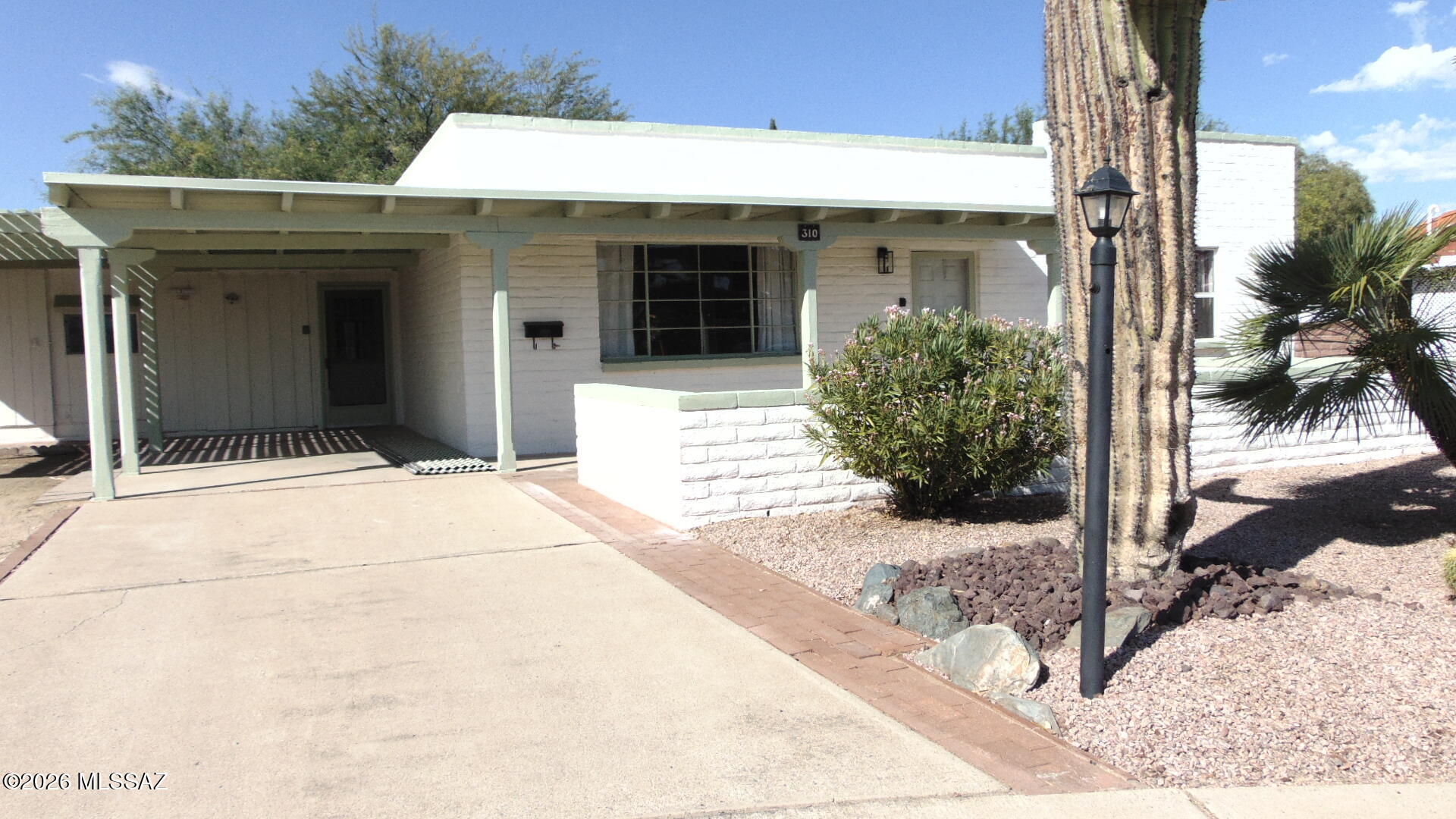 Spacious home in quiet neighborhood, 2 bedrooms, sitting room off primary bedroom, plus large AZ room, updated bath rooms (no tubs)  If you love the desert you will love the back yard.  Low maintenance, mature cacti in raised beds,