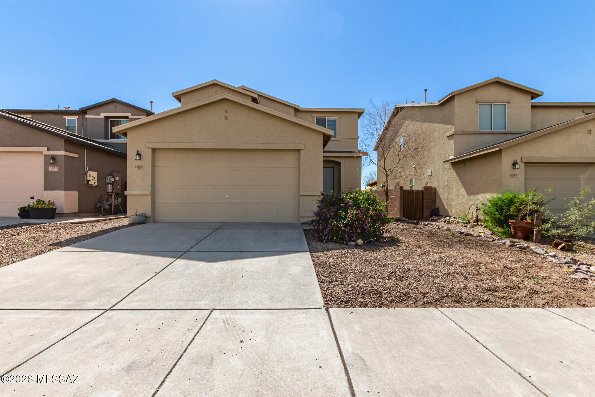 Charming two-story home awaits you here in River Terrace! Offering 3 beds, 2 baths + powder room, and a 2-car garage. The inviting interior features tons of natural light, a neutral palette, recessed lighting, wood-look tile flooring downstairs, and soft carpet on the upper level. Showcasing separate living & family rooms, this gem offers flexible spaces for entertaining. The kitchen boasts built-in appliances, ample wood cabinetry, recessed lighting, a pantry, and a 2-tier peninsula w/breakfast bar. All bedrooms are upstairs, along with a versatile loft! The primary bedroom has a walk-in closet and a full bathroom. Check out the large backyard with an extended covered patio, where you can relax or enjoy BBQ! With your creative ideas, you can make it a complete outdoor oasis. Welcome home!