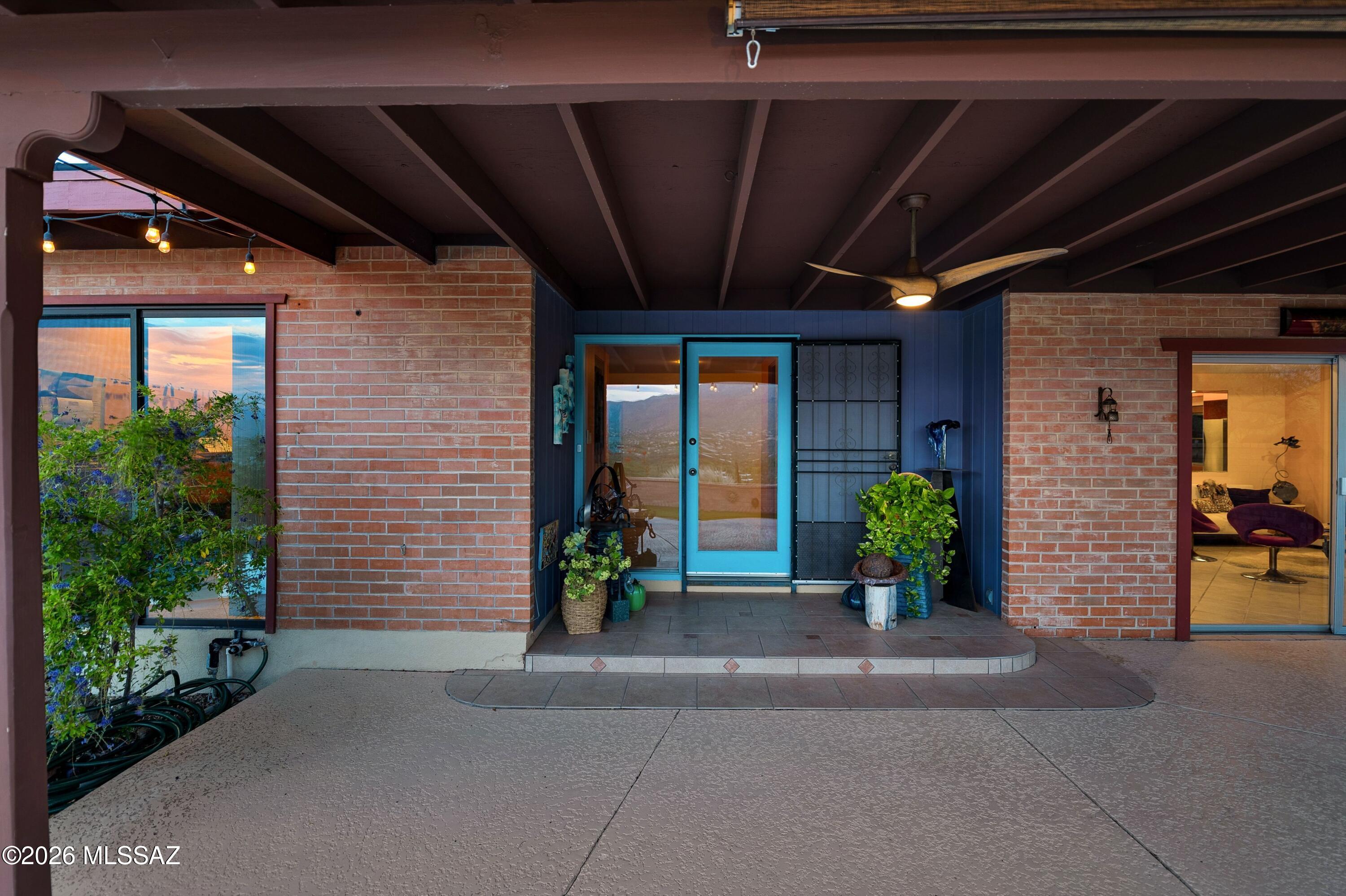 Mid-century modern 3 BR, 2.5 BA home with a large den, built into a private hillside on 1.3 acres in the coveted subdivision of Hidden Valley. Fully updated with today's finishes, the home captures panoramic Santa Catalina Mountain and valley views from nearly every room. The open kitchen features a mosaic glass tile backsplash, stainless steel appliances including a French-door refrigerator and gas range, and light wood cabinetry, opening directly to the living and dining areas around a brick, wood mantled fireplace. The primary suite includes an infrared sauna and en-suite bath. Outside, a solar heated pool and covered, string-lit patio create an entertaining space framed by mature saguaro, prickly pear, and mesquite trees.  The 1.3-acre desert lot offers exceptional privacy and mature, low-maintenance desert landscaping throughout.

Walking distance to Wes Miller Park, a natural-habitat preserve donated to the Hidden Valley Homeowners Association by the subdivision's developer and protected under a conservation easement with The Nature Conservancy as part of the Sabino Creek ecosystem. Set in the Hidden Valley area of Tucson, the home is also minutes from Sabino Canyon, Ventana Canyon, and the shops and restaurants along Sunrise Drive and Skyline Drive.

Come experience mountain-view living in Hidden Valley -- schedule your private tour of this Tucson, Arizona hillside retreat today.