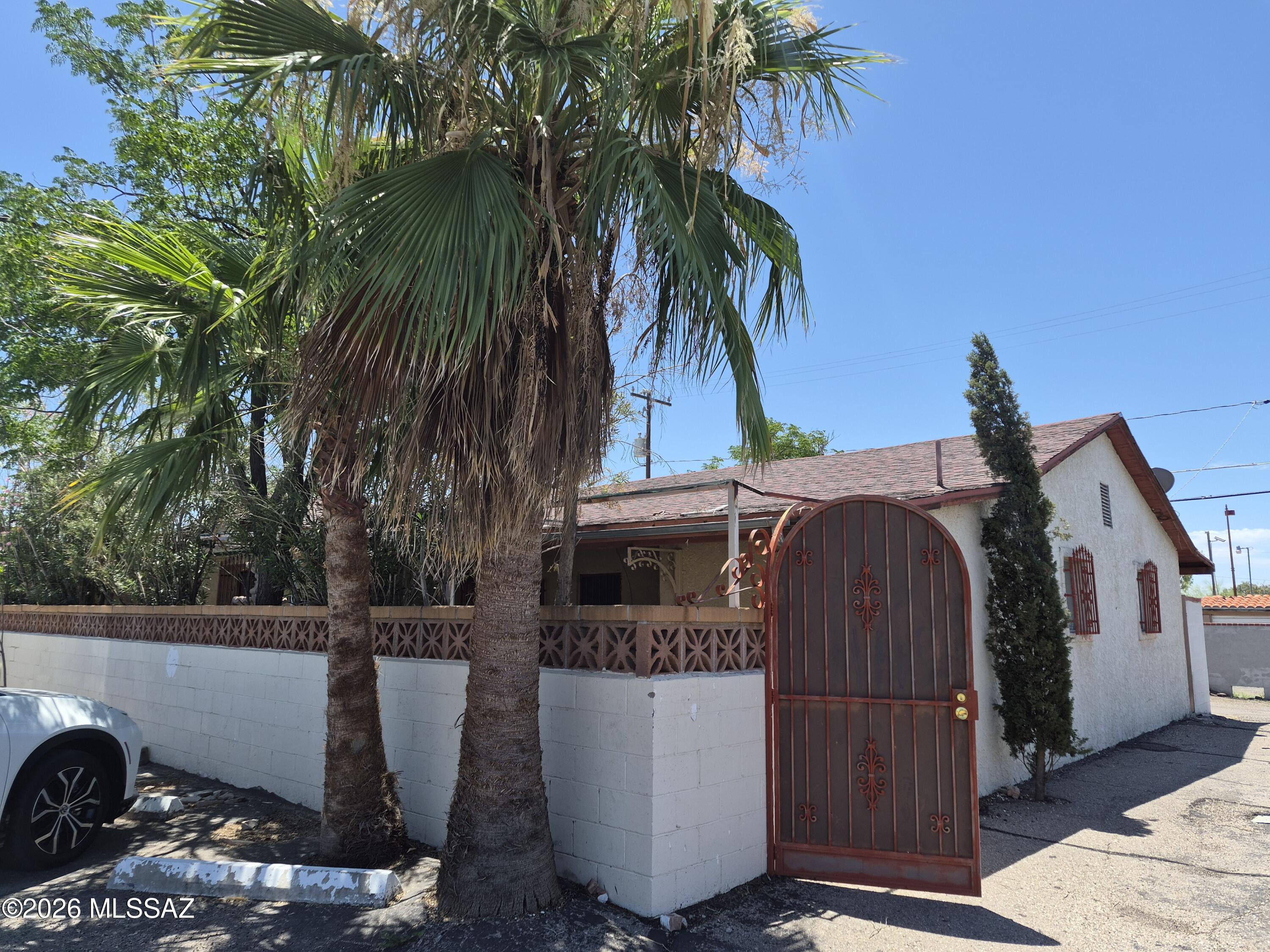 Looking for space, character, and comfort? This beautiful hacienda-style home has it all! Featuring 4 spacious bedrooms with a desirable split-bedroom floor plan, this home offers plenty of room to spread out with a separate family room, formal dining room, and living room. One bedroom includes a private en-suite bathroom, perfect for guests or multi-generational living. Full of Southwestern charm, you'll find original Saltillo tile in the kitchen and dining areas, decorative niches, recessed shelving, and ceramic tile flooring throughout--no carpet! Enter through a welcoming covered courtyard-style entrance and enjoy the unique character and spacious layout this home offers. A rare rental opportunity that combines charm, functionality, and plenty of living space. Bathtub jets not working