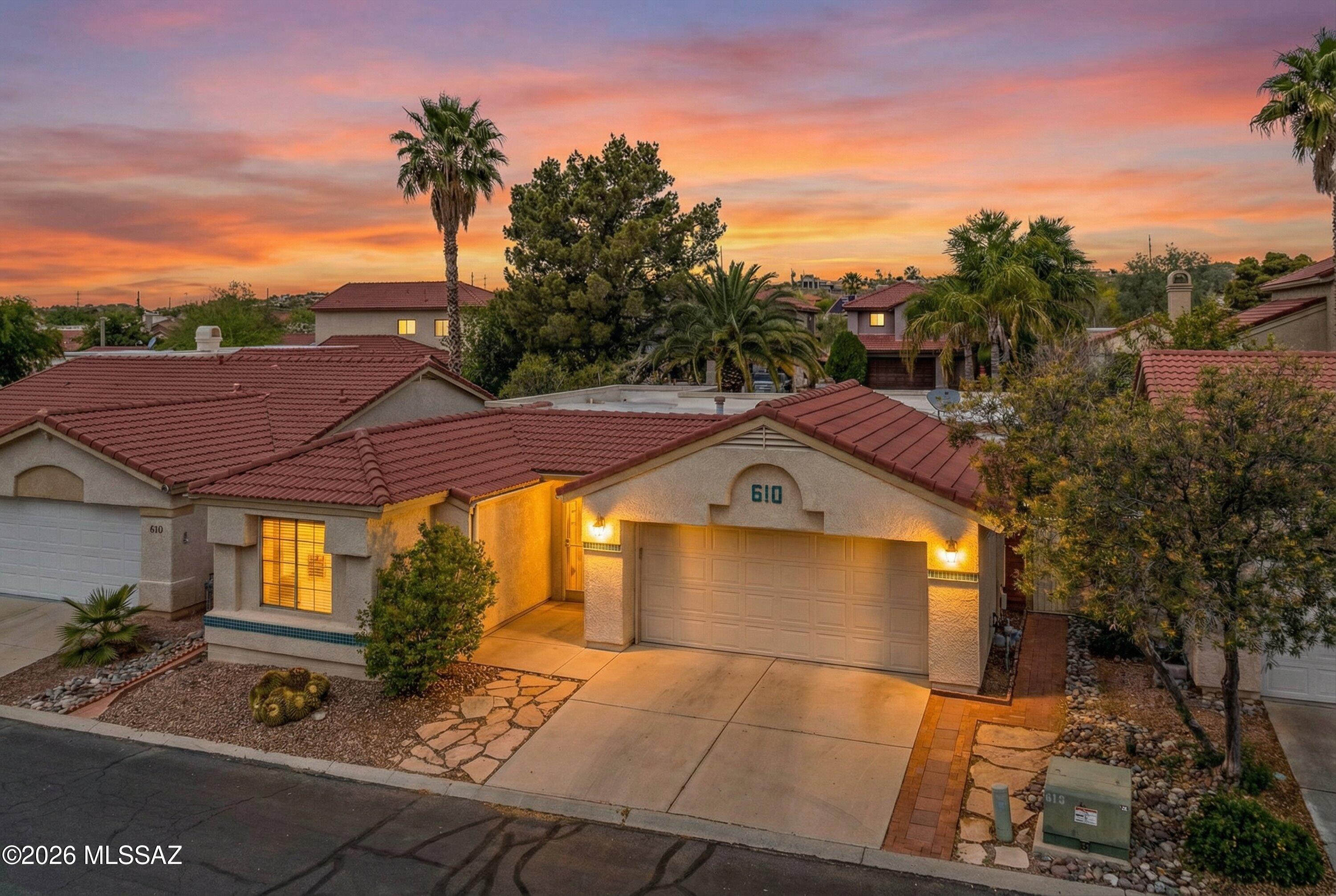 This charming Oro Valley home offers a bright, open layout with a desirable split bedroom floor plan, featuring 2 bedrooms, 2 bathrooms, and a versatile den--perfect for a home office, hobby space, or easily converted into a third bedroom.
The kitchen features stainless steel appliances, ample cabinet storage, and a functional layout that opens to the main living area. Enjoy both an eat-in kitchen space and a separate dining area, offering flexibility for everyday living and entertaining.
Both bathrooms have been thoughtfully updated with renovated shower and tub areas. The primary bathroom features a beautifully tiled walk-in shower with glass enclosure and modern finishes, while the secondary bathroom offers an updated tub/shower combination--providing both style and functionality.
Enjoy outdoor living with a private backyard and low-maintenance landscaping, while the front of the home captures beautiful Pusch Ridge views. The community features a pool and spa, with HOA services that include trash and common area maintenance.
Ideally located near Riverfront Park, this home offers convenient access to shopping, dining, and everyday amenities.
A wonderful opportunity to enjoy comfort, convenience, and the beauty of Oro Valley.