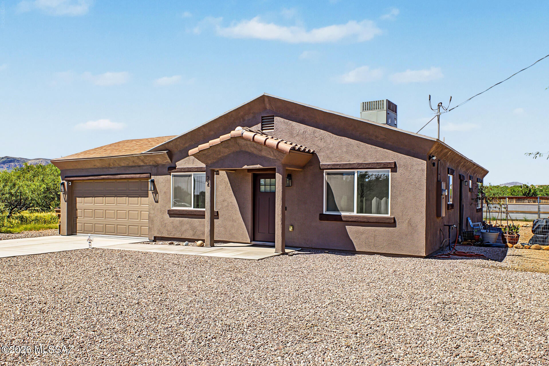 This home qualifies for the USDA Zero Down Payment assistance program! SELLER CAN OFFER A CONCESSION WITH AN ACCEPTABLE OFFER! This 3-bedroom, 2-bath residence welcomes you with a 1.5-car garage and is surrounded by breathtaking mountain views that provide a picturesque backdrop. Inside, you'll find an inviting living room with high ceilings, a soothing palette, and durable tile flooring. The eat-in kitchen offers granite counters, ample wood cabinetry with crown moulding, recessed lighting, sleek stainless steel appliances, and a center island for extra prep space. The main bedroom includes a private bathroom and a practical walk-in closet. Outside, the sizeable backyard features abundant space to craft your dream oasis and al fresco relaxation. Don't miss o