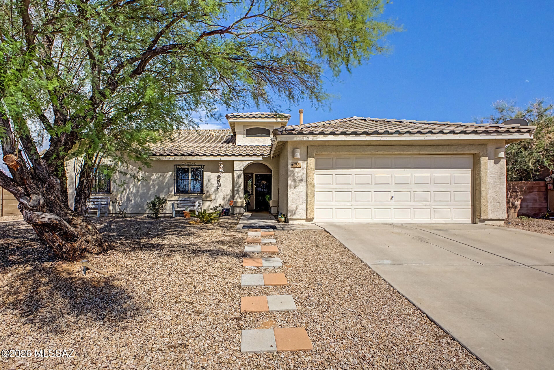 Welcome to this lovely 4-bedroom, 2-bath home featuring a spacious open floor plan with vaulted ceilings, a soothing neutral palette, blinds, charming bay window, and a mix of tile and soft carpeting. The gourmet kitchen offers solid-surface counters, white cabinetry, mosaic tile backsplash, stainless steel appliances, pantry, and a two-tier island with breakfast bar. The primary suite features a walk-in closet and private bath with dual sinks. Enjoy the peaceful backyard with a large patio, gazebo, storage shed, and stunning mountain views. A wonderful place to call home!