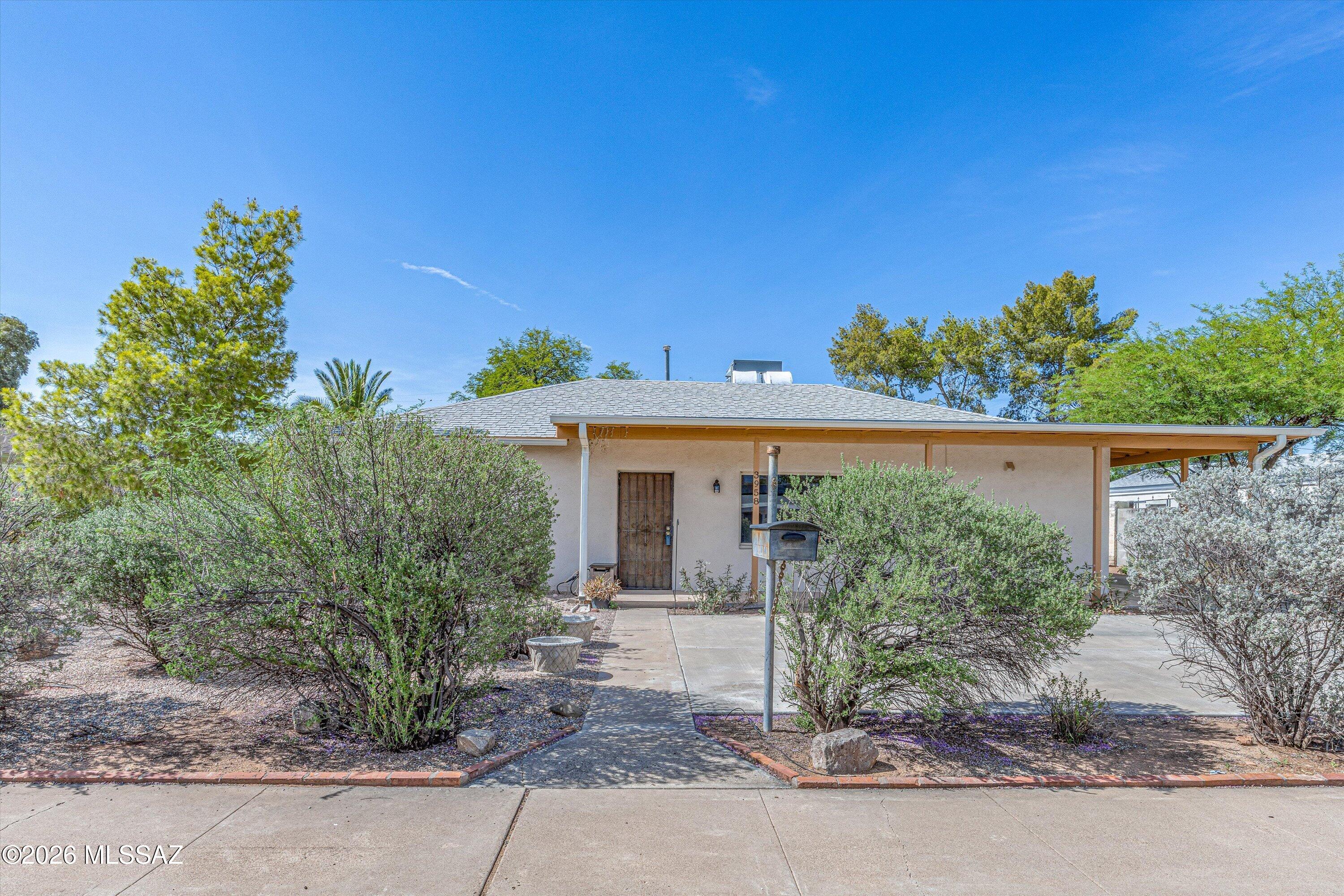 Welcome to this beautifully maintained central Tucson home, 3 bedroom 2 bath 2 car detached garage. Previous renovations expanded the primary suite to include a private bath and spacious walk-in closet.

Step outside to your own backyard retreat featuring a gazebo with paver patio--perfect for relaxing or entertaining--along with mature citrus trees, including lemon, orange, and pomegranate. Conveniently located near shopping, dining, and everyday amenities, this move-in ready home blends modern updates with timeless charm.