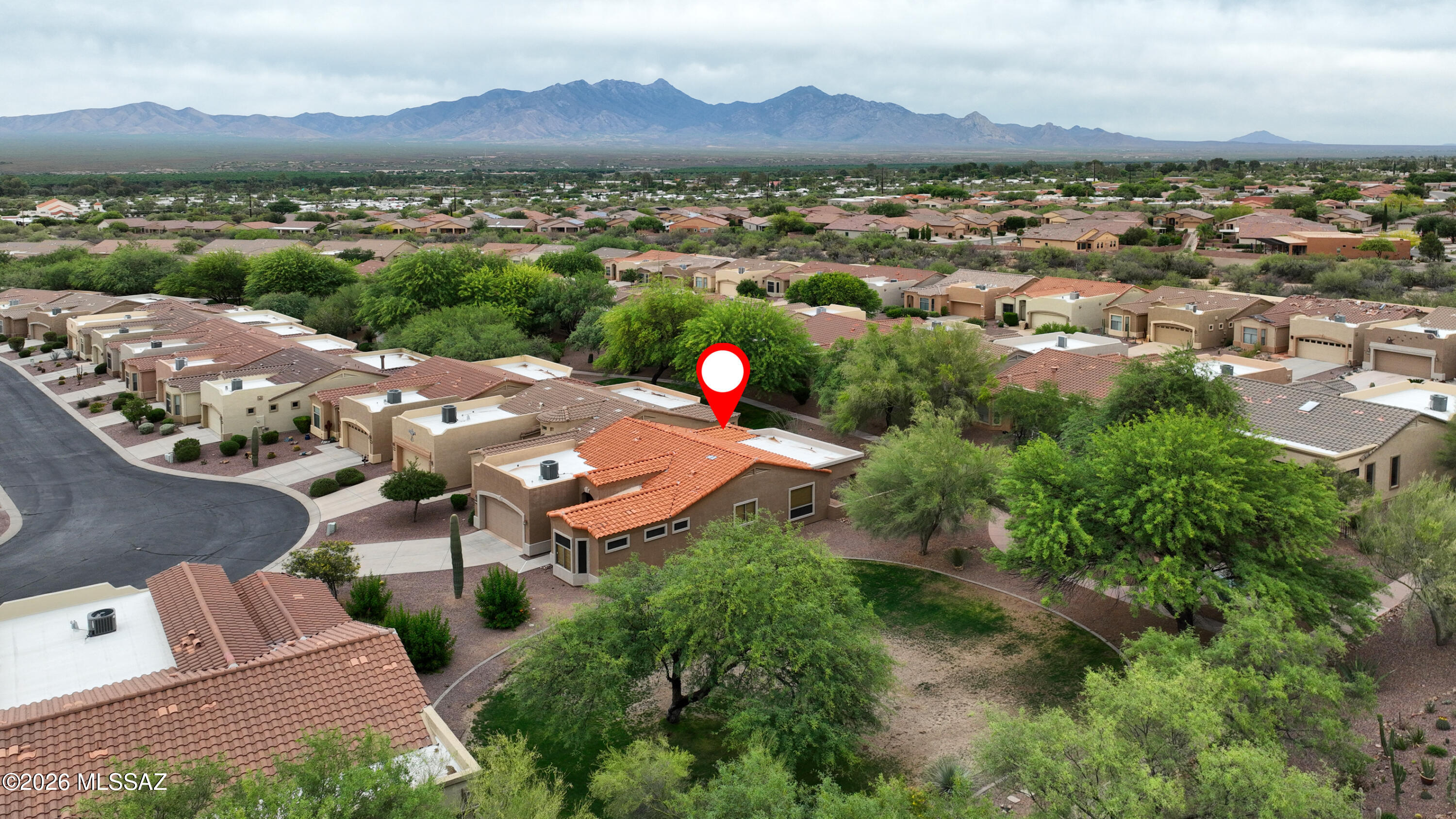 Upgrades throughout: tile throughout, stainless steel appliances, Sun Screens, Insulated Garage, Vaulted Ceilings, Saltillo Tile on outdoor patio, bay windows, both bedrooms have en-suite baths, walk-in closets, and many more upgrades. HOA covers exterior paint, stucco, roof, landscaping, pest control, cable, trash/recycle, fire hazard and liability insurance, security gate access 6:00 pm - 6:00 am. End unit adjacent to neighborhood park and green belt. Green Valley Recreation.