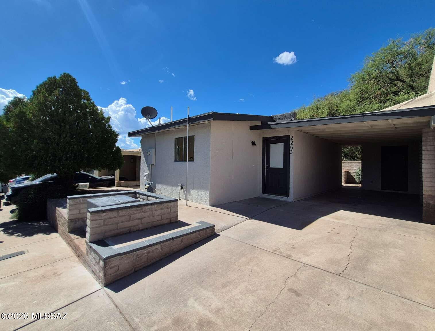 Great location for this beautifully remodeled townhome in Nogales centrally located to all shopping areas. Fully remodeled, this home is a perfect starter home or investment. The home features a new roof, LVP flooring throughout, fresh paint inside and out, new kitchen, fixtures, etc. Storage room and small patio out back a plus. Owner-agent (inactive license).