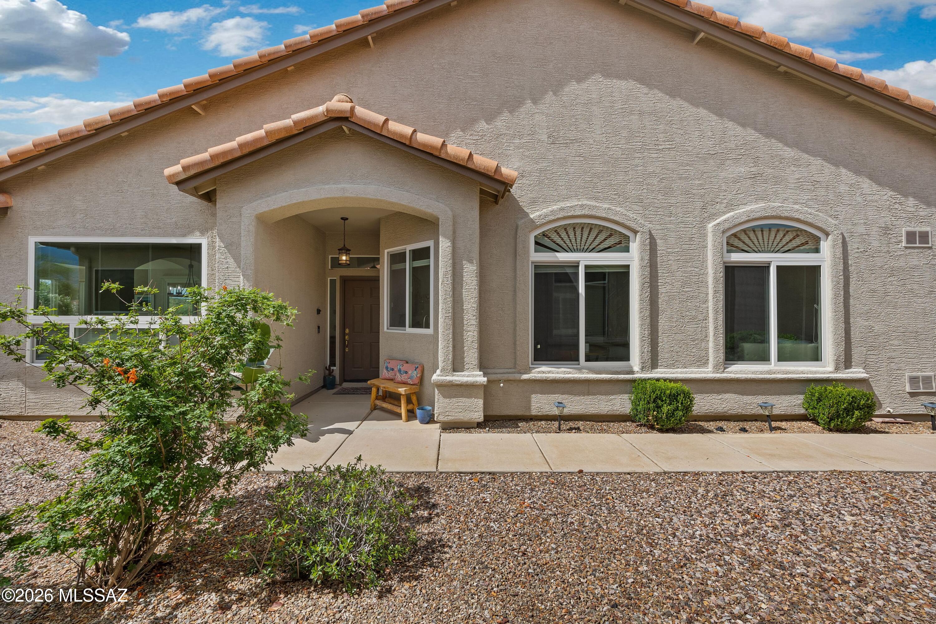 Perfect Location & Mountain Views! Bright, open & Airy Riviera Villa is a 3-min. walk to SaddleBrooke1 Clubhouse Dining, Pools, Golf, Fitness, & much more. Split floor plan provides privacy for you & your guests. Fantastic mountain views from the great room, patio & primary bedroom. Continuous Tile throughout. Kitchen has plenty of cabinetry w/ roll out shelves, counter space, island & breakfast nook. Spacious primary bedroom with En-Suite. 2nd bedroom could also be used as a den.  Both bathrooms updated 2026. Newer double pane, low-E windows & Upgraded window coverings. 
NEW ROOF 2020. 
HOA maintains exterior, roof, pest control, landscaping & structure insurance.  Whole house water softener and filtration system, plus loads of garage storage for all your toys. This move-in ready Villa is perfect for full time or seasonal visitors, or the investor looking for a low-maintenance investment property. HVAC, water heater, and appliances approximately 8 years old. The HOA takes care of your outside pest control, landscaping and roof. The roof was replaced in 2020. These outstanding HOA benefits ensure worry-free living so you can relax and enjoy all that SaddleBrooke and the beautiful surrounding areas have to offer! Cafe style or sit-down dining is available and are only a quick 3 minute walk to the Clubhouse restaurants, so you don't even need to cook if you are tired from a day of Golf, Pickleball, or Tennis!
Come live in the SaddleBrooke One Villas and enjoy Arizona's premier 55+ active community seasonally or year round! 
Love where we live!