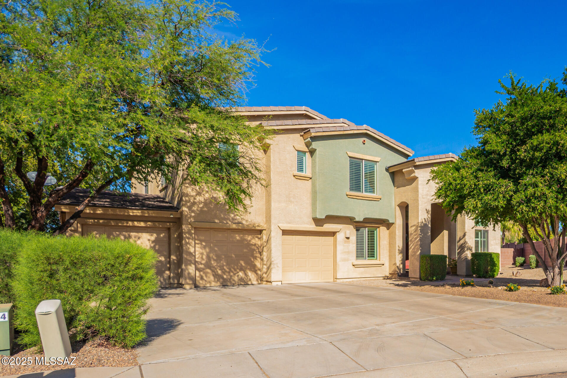 DREAM HOME in a cul-de-sac is finally within reach! Explore what this gated community in Ironwood Reserve has to offer. Located in the heart of the Tucson mountains with all the amenities just a short distance away from groceries stores, gas stations, medical facilities, walking and biking trails, and so much more! This gorgeous home features 4,739 sq ft including 5-bedrooms, 4.5-bathrooms, flex room, multimedia room, a 3-car garage, and located on a large lot. Amazing curb appeal with mature trees for natural shade, stylish pavers, and an inviting covered front porch. Inside, you will discover the perfect blend of comfort, style, and functionality. Thoughtfully designed for modern living, this home offers an ideal sanctuary for families and those who love to entertain. Captivating interior and open floor plan include a welcoming living room with soaring vaulted ceilings, recessed lighting, a soothing palette, classic plantation shutters, and gorgeous tile flooring throughout the main living spaces.  Gather loved ones in the family room, which includes a modern gas fireplace for quiet moments with views of the backyard. The formal dining room is perfect for special dinner gatherings with friends and family. 

Downstairs, you will find 1-bedroom with a private bathroom. The bonus room/den provides a versatile space for an office or study. There is also an additional ½ bathroom, and the laundry room is also downstairs. Culinary adventures await in the stunning eat-in kitchen, equipped with granite counters, abundant wood cabinetry with crown moulding, SS appliances, gas cooktop with double ovens, a cabinet pantry, and an island with a breakfast bar for casual dining. 

Upstairs, you will also find a cozy loft with a built-in surround sound system, perfect for a home theater or a media room. There is a hallway bathroom located nearby. Double doors lead to the large luxurious primary bedroom, showcasing tile flooring, 2 walk-in closets for extensive wardrobes, and a spa-like ensuite bathroom with dual vanities, a relaxing soaking tub and a separate tiled shower with a sitting bench for added comfort. The remaining 3-bedrooms are all located upstairs are ample size with soft carpeting and share another hallway bathroom. 

This incredible gem is a fantastic find for anyone seeking a blend of luxury and comfort in a highly desirable location. Spend peaceful afternoons in the lovely backyard, which offers a extended covered paver patio, a manicured grass lawn, breathtaking mountain views, and tons of space for outdoor activities. Don't miss out!