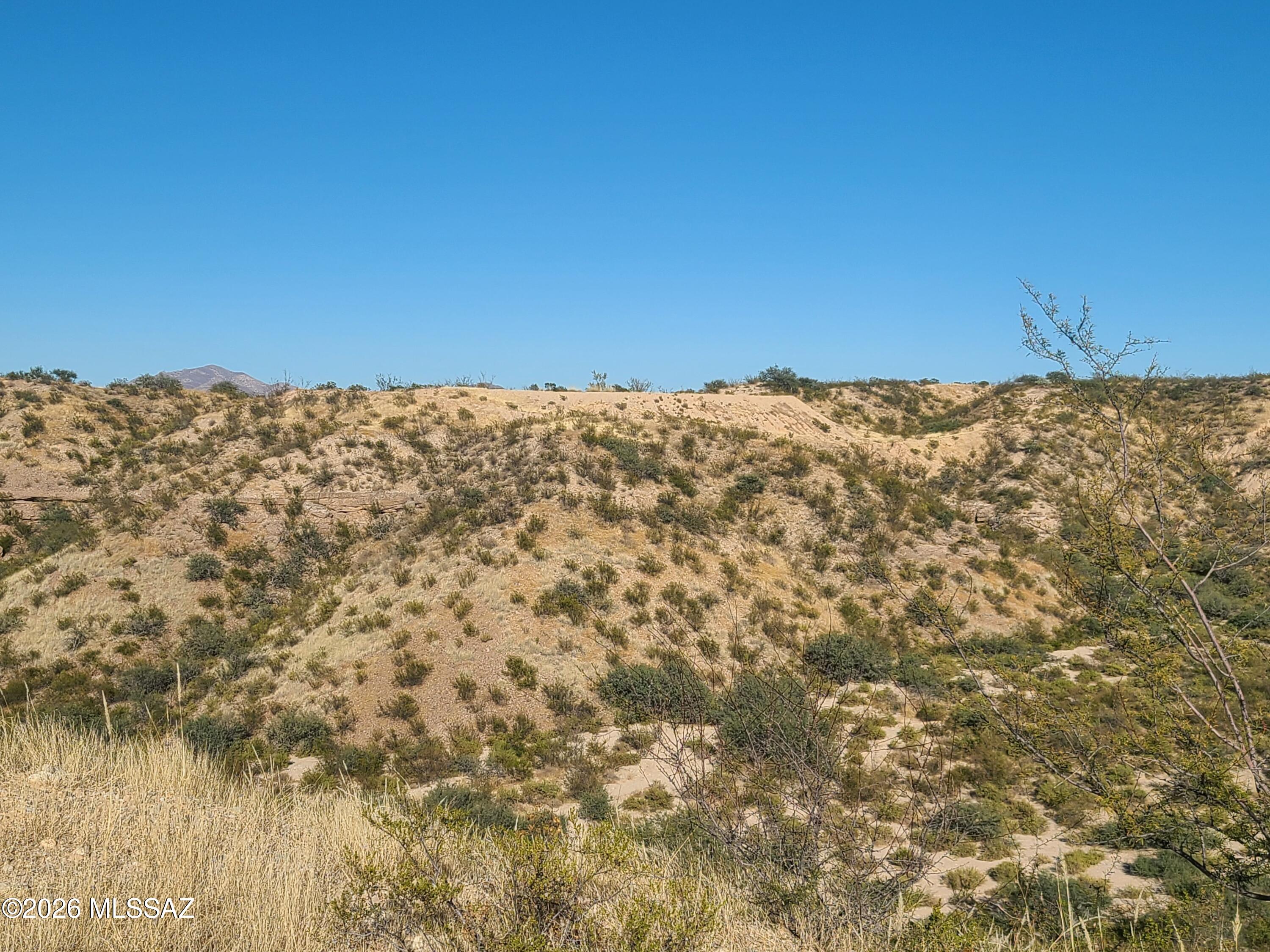 This horse friendly property features rural living and amazing views. The 16 +/- acre lot is divided into four parcels with a well share. 120-08-006H,J, K and P.