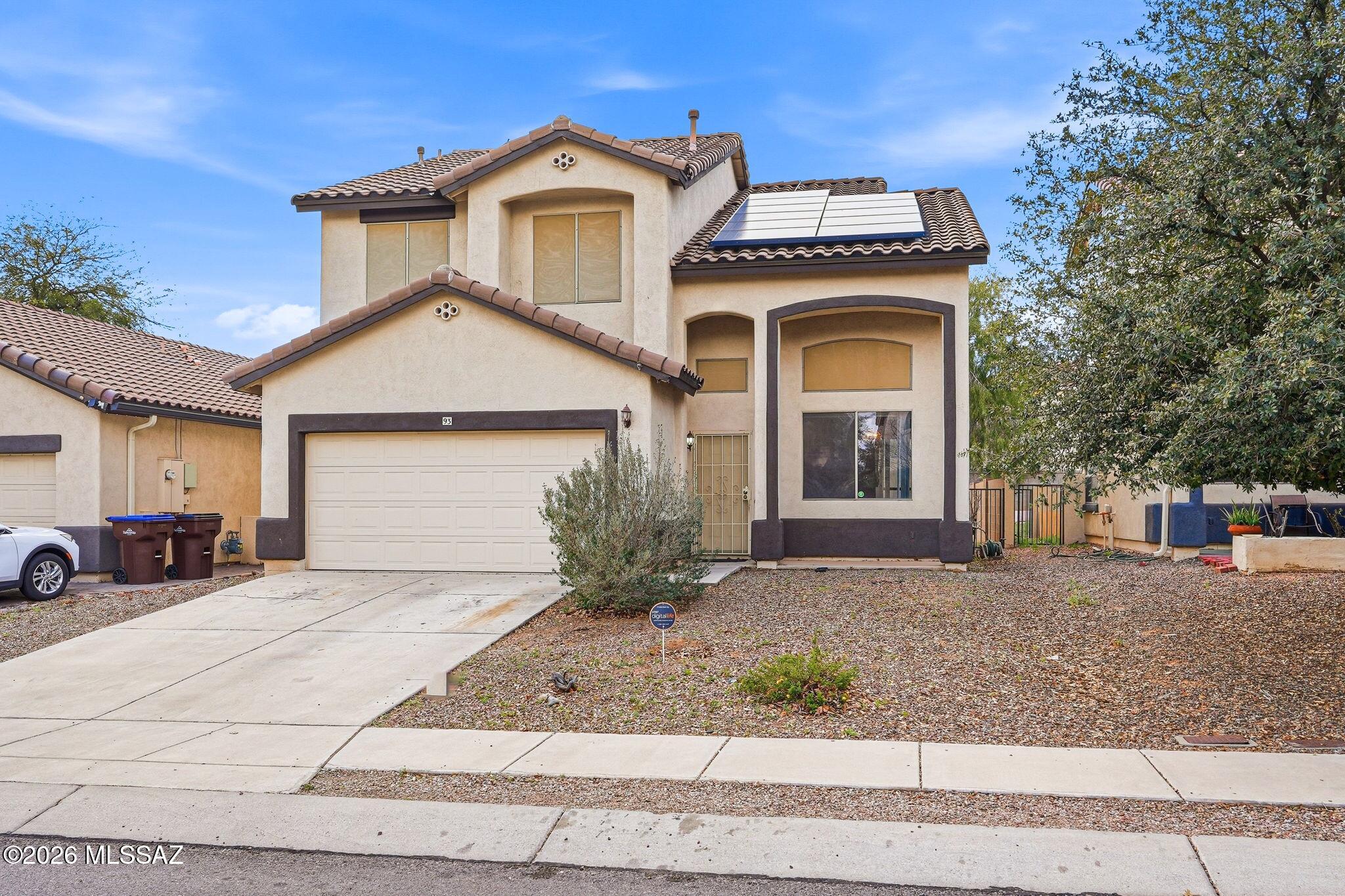 Welcome to this spacious and well-designed two-story 3 bedroom 2.5 baths home in Rancho Sahuarita. Kitchen has plenty of cabinets, center island, walk-in pantry. HVAC was replace in 2024.Large master suite with big closet. Prewire for surround sound in family room and patio, perfect for entertaining.Tesla solar panels for incredible energy savings. Located in the vibrant Rancho Sahuarita Community where residents enjoy access to beautiful parks, sparkling pool, fitness center and activities  for all ages.