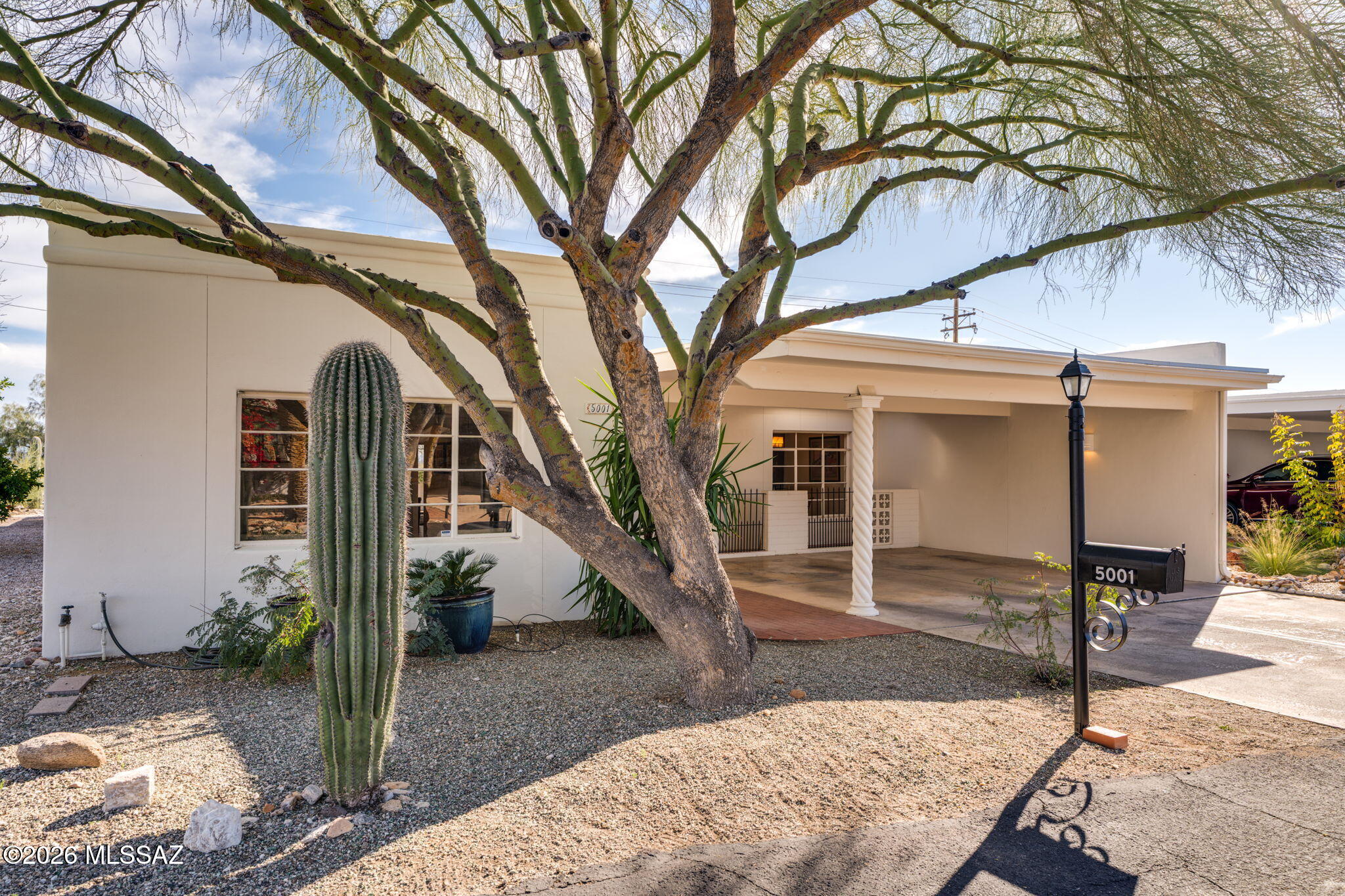 Popular 55+ Foothills Community! This beautifully maintained & recently updated 1989 sq ft 2BR, 2BA townhome is open & bright incl a huge great room w/open space for living/dining, beehive fireplace & breakfast bar. Large kitchen incl stainless appliances w/Viking range, large breakfast nook & huge wet bar, all suitable for entertaining small intimate gatherings or larger groups. Large, covered patio, private easy-to-maintain side & rear yards, w/mountain views, city lights, & sunsets. Large primary bedroom w/walk-in closet, large bathroom/dual sinks & walk-in shower. Guest bedroom equally large, w/dual closets, & incredible views of the Catalinas. Large guest bath. Ceramic tile throughout (carpet in bedrooms). Large community pool just down the street. OWNER/AGENT