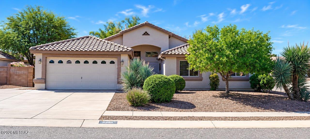 Nicely maintained, clean 4/2 on East side, near schools and shopping. HVAC replaced in 2026. Large upgraded shower in Primary bath. Shed in back yard for extra storage. Built in cabinets in garage. Epoxied garage floor. Primary suite is extra large. Hallway storage with 2 closets. Expensive and custom Crystal Chandeliers (2) hanging in foyer and dining area convey with home. Open and expansive kitchen with storage and built in pantry closet, adjacent to large family room that has views of the back yard. Fruit tree and simple landscaping, front and back make these areas easy to care for. Mountain views available from the front of the home to the East.