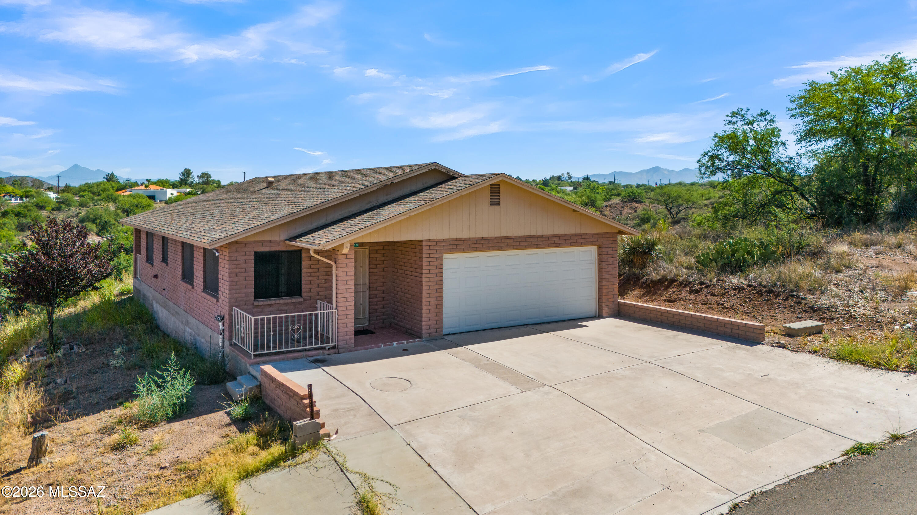 Discover this charming home located in a highly desirable neighborhood with stunning views. Built with durable brick construction, this property offers 3 bedrooms and 2 bathrooms, providing comfortable living space for families, retirees, or first-time buyers.

The home features a spacious kitchen with a natural gas range and oven, perfect for everyday cooking and entertaining. Additional highlights include a two-car garage, sewer connection, and the added benefit of no homeowners association (HOA) fees.

Conveniently situated approximately 3 miles from the Mexico border, this property combines scenic surroundings, practical amenities, and an excellent location.