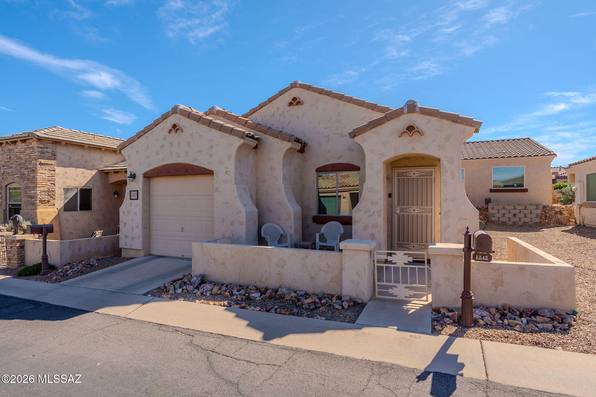 Welcome home to this charming 715 sq. ft. stick-built Pulte home offering 1 bedroom, 1 bathroom, and attached 1-car garage. Designed with comfort and easy living in mind, this light-filled home features neutral paint, durable tile flooring and laminate throughout, and a functional open layout. Enjoy your morning coffee or unwind in the private walled courtyard, the perfect spot to soak up Arizona's beautiful sunshine. A full-size washer and dryer are included for added convenience. Located in a gated 55+ community, you'll be just steps from the impressive clubhouse featuring a fitness center, large outdoor pool, billiards, library, and a variety of social activities and amenities. This is low-maintenance living at its best in an active, welcoming community!