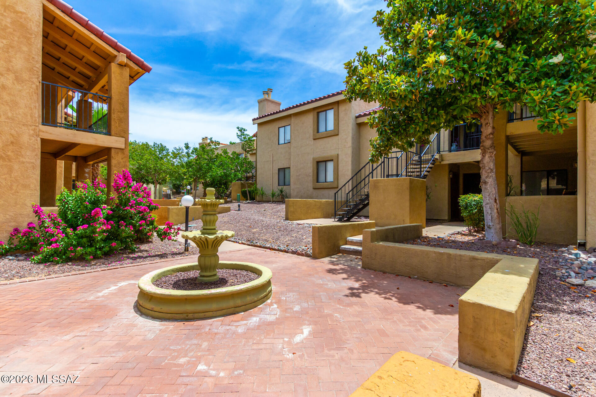 Stunning Oversized 2-Bedroom, 2-Bathroom Condo!

Welcome home to this spacious and inviting condo featuring beautiful French doors that open to an unbeatable view. Enjoy the convenience of a newer in-unit stackable washer and dryer, a fully functional kitchen, and a cozy corner fireplace perfect for relaxing on cool Tucson evenings.

Stay comfortable year-round with efficient HVAC and refreshing cold air--an absolute must during Tucson's summer heat. The thoughtfully designed layout offers generous living spaces and plenty of natural light throughout.

Conveniently located with a straight shot to the University of Arizona, this home is also within walking distance of shopping, great restaurants, parks, and outdoor recreation.... MORE> ..... Residents enjoy an assigned private parking space, as well as access to the community pool and spa.

This exceptional condo offers the perfect combination of comfort, convenience, and location. Schedule your showing today--this one won't last long! <á(