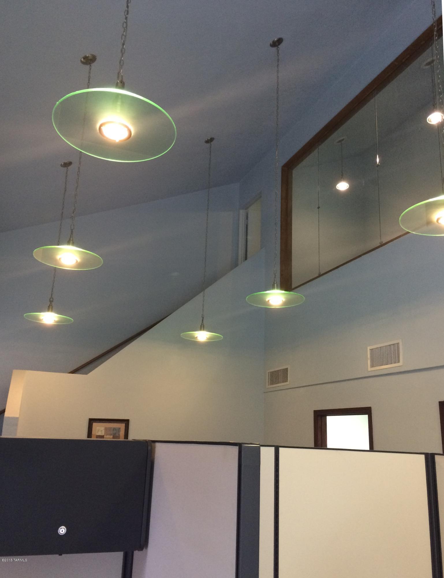 OFFICE PLUS LOFT! Modern, furnished 1,086 SF office for lease near U of A, UMC, convenient to downtown. Includes 4 workstations, 2 private offices, and upstairs loft. Take advantage of this fantastic price and location!