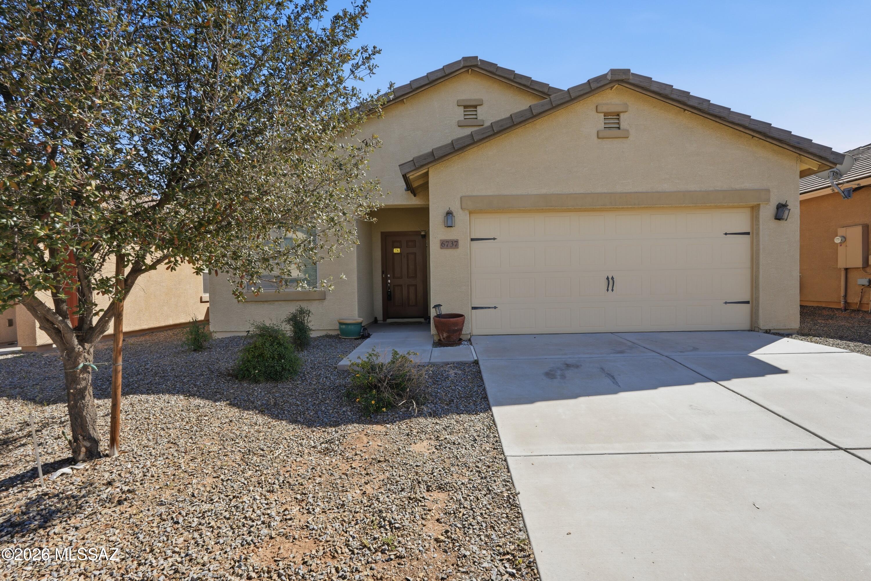 No Application Fees! Single level 3 bedroom, 2 bathroom Tucson home located in Caddis Haley Estates offering a comfortable open floor plan and bright natural lighting throughout. The home features tile flooring in the kitchen with neutral carpeting in the living areas and bedrooms, neutral paint, and a spacious living room that flows into the kitchen and dining area. The kitchen includes granite countertops and backsplash, upgraded cabinetry, separate pantry, dining area, gas range, and all appliances. The larger primary suite offers a sizable closet and attached private bathroom with step in shower. Washing machine and dryer are included. The property also features easy to maintain desert landscaping in both the front and back yards. Caddis Haley Estates is located in Southwest Tucson near Valencia Road and Vahalla Road, providing convenient access to shopping, dining, neighborhood parks, and everyday services. The area offers quick connectivity to I10, nearby schools, and growing residential developments while maintaining a quiet neighborhood setting.

All Denali Real Estate residents are automatically enrolled in the Resident Benefits Package (RBP) for $55.00/month which includes Renter's Liability Insurance, Credit Building to help boost the resident's credit scores with timely rent payments, up to $1M Identity Theft Protection, HVAC air filter delivery (for applicable properties), our best-in-class resident rewards program, and much more!