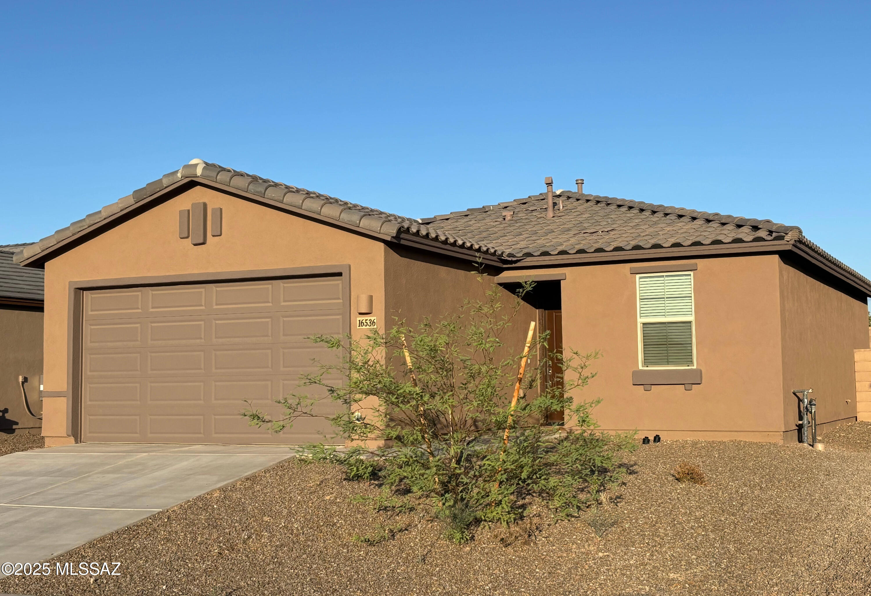APPROVED FHA Pre-Foreclosure Short Sale! Lovely Lennar built Pantano Plan. Entry foyer, soaring ceilings, diffuse natural light, a truly split bedroom floorplan & sensational energy efficiency (HERS 45) are some of the fab features here. Greatroom overlooks super secluded backyard. Kitchen includes.it.all & then some. Primary bedroom accommodates a sitting area, plus bathroom & closet are shareable. Generously sized & private secondary bedrooms. Laundry room includes washer/dryer. Built & certified energy efficient along with water conservation & indoor air quality features. Inviting & private backyard with attractive white rock, concrete stepping pads, framed turf patch & solar lighting. Finished two car garage has 220 outlet. Tankless Rannai gas water heater. Low maintenance concrete tile roof. Taexx built-in pest control system. Elementary school & community park nearby. Plus, a plethora of master planned Rancho Sahuarita lifestyle amenities!