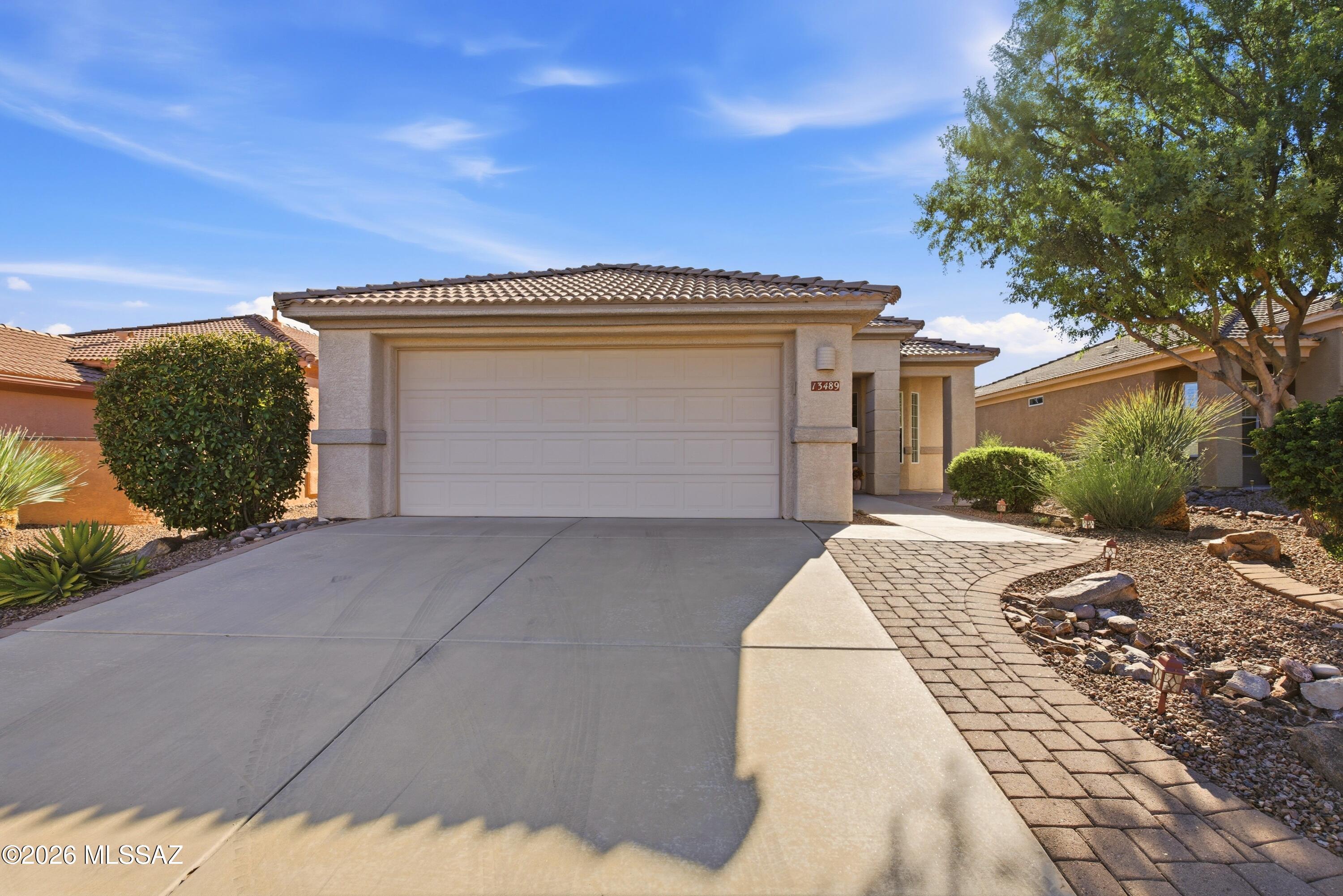 Welcome to easy living in the highly sought-after 55+ community of The Highlands at Dove Mountain. This beautifully maintained 2-bedroom, 2-bath home with a flex room offers 1,605 sq. ft. of thoughtfully designed living space featuring an open floor plan, spacious living and dining areas, a bright kitchen with breakfast nook, and a separate family room perfect for relaxing or entertaining. The split-bedroom layout provides privacy, while the covered patio and low-maintenance landscaping make it easy to enjoy Arizona's beautiful weather. Residents enjoy resort-style amenities including golf, pickleball, clubhouse, fitness center, pool, spa, walking paths, and an active social calendar, all just minutes from shopping, dining, hiking, and I-10.