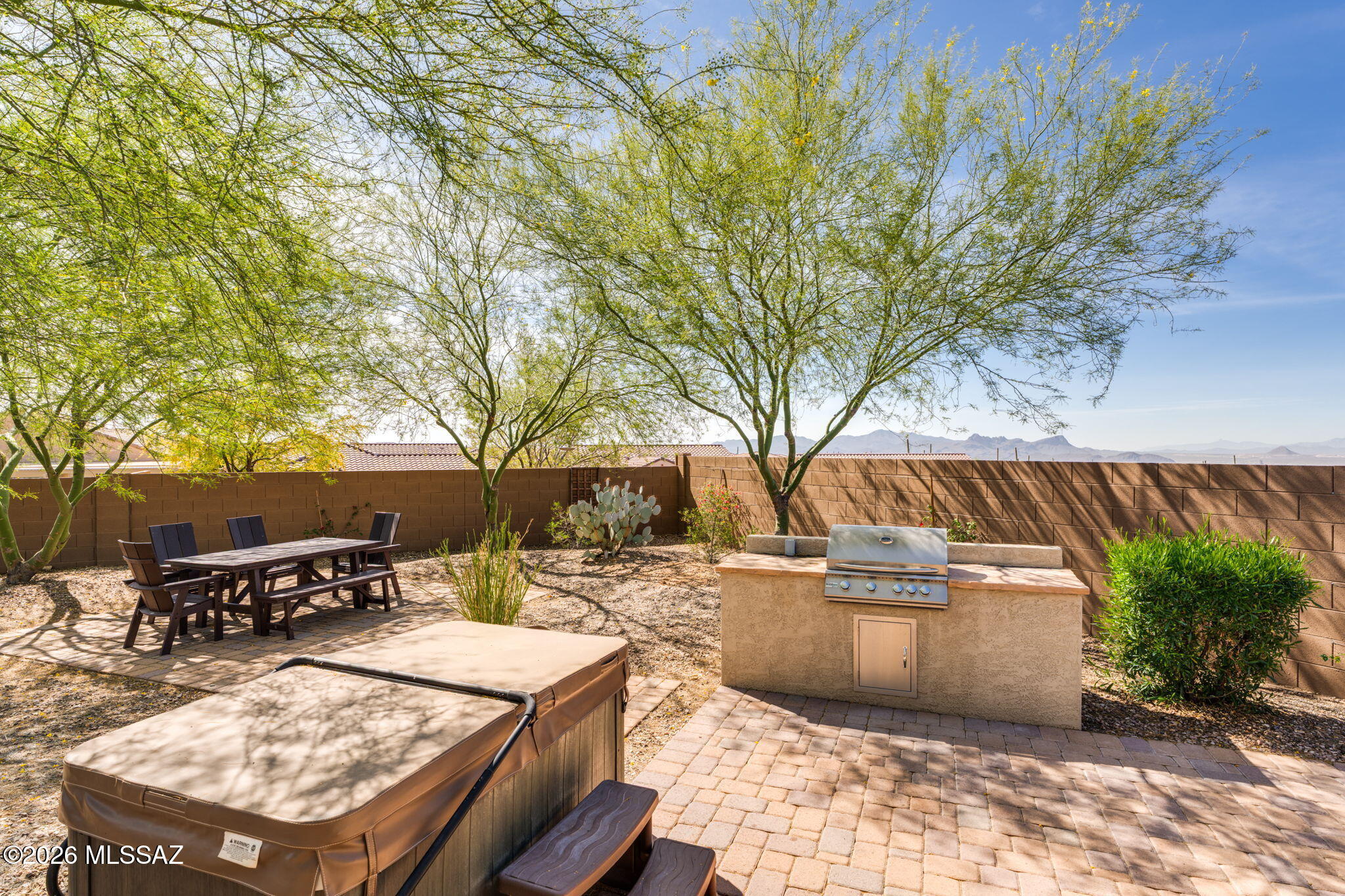 Superbly maintained Pulte build in amenity-rich Del Webb at Dove Mountain - this property is only minutes away from some of the area's best shopping, dining, entertainment, and recreation. 

Interior features include intelligent layout (Pulte's ''Sanctuary'' Floorplan) & tasteful contemporary touches; proper entryway foyer; ceramic tile flooring; high ceilings with recessed lighting; expansive great room open to spacious kitchen & dining (center island w/ bistro-height breakfast bar, quartz countertops, subway tile backsplash, & stainless steel appliances, including gas oven & range); primary bedroom features full ensuite bathroom with double-vanity, standing shower, and customized walk-in closet; 2nd bedroom off 2nd full bathroom, split from 3rd bedroom with Custom Closet/Murphy Bed - all reinforcing preferential value & practical utility.

Exterior features include attractive architectural accents & easy-care desert hardscape & landscaping, plus premium pavers, front & back; front courtyard and backyard both securely gated & walled - offering a variety of serene sanctuaries as well as exciting entertainment spaces, including back covered patio with outdoor fireplace leading to outdoor grill (fully connected gas line) perfect for al fresco dining.

Extended 2-car garage and driveway provide ample private parking, too. 

Experience for yourself how this dynamic property is set & ready for discerning buyers looking to beautifully balance a lifestyle of leisure & luxury.