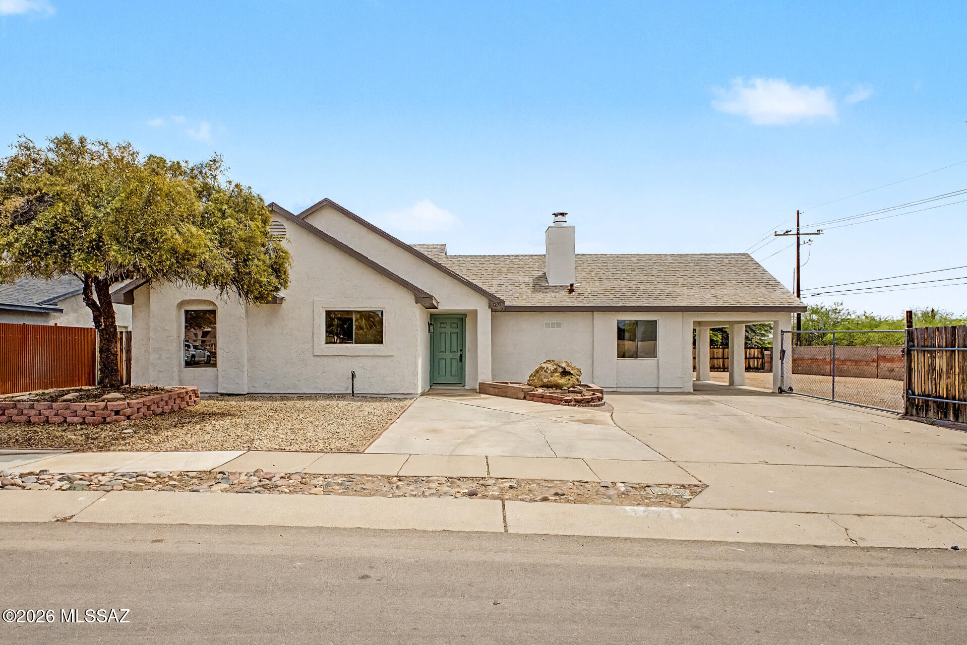 Seller will counter or accept offers between $300,000 - $320,000. New Listing Alert! Beautifully updated 4 bedroom home.  Features include luxury plank flooring, plush carpet in bedrooms, modern electrical and plumbing fixtures, updated door hardware, Quartz countertops, warm cabinetry, fresh interior paint, and stainless steel appliances. Bathrooms showcase stylish tile shower surrounds.  Soaring vaulted ceilings.  Large corner lot with double gate and extra storage. Move-in ready and a must see!