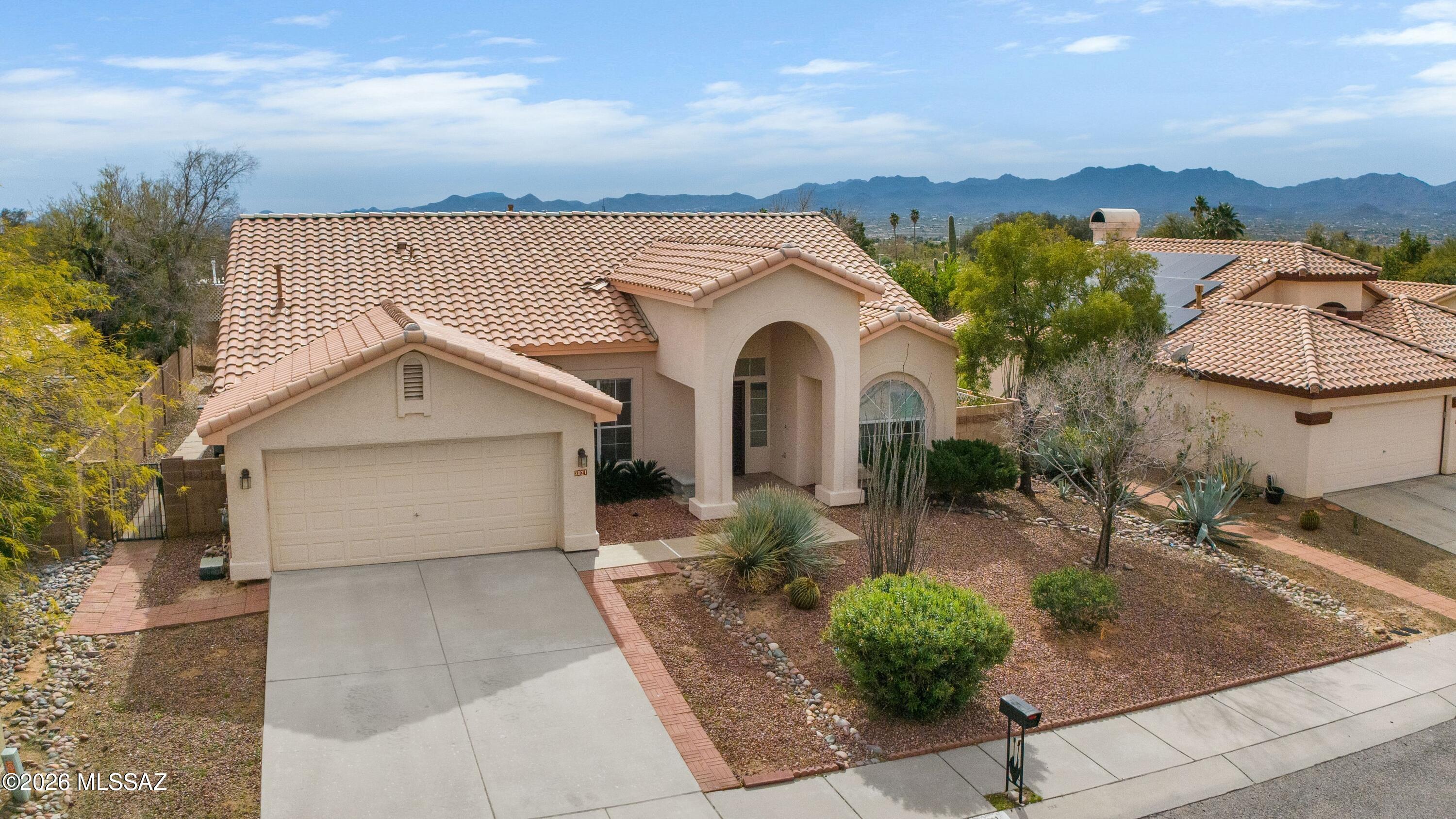 ***NEW PRICE*** Freshly painted, this meticulously maintained home is truly move-in ready. This spacious 3-bedroom, 2-bath home also features a large den and a versatile floor plan. Enjoy a generous primary suite with walk-in closet and an oversized bath complete with spa tub and separate shower. Multiple living areas include a formal living and dining room, a family room off the kitchen, and a separate breakfast area. Step outside to an expansive, private backyard featuring 2 sheds, a conventional spa, mature fruit trees, custom landscaping, a covered patio, and ample space for a future pool perfect for gatherings and outdoor entertainment. Great location in the Northwest near shopping, dining, golf and The Loop. No Poly pipes.