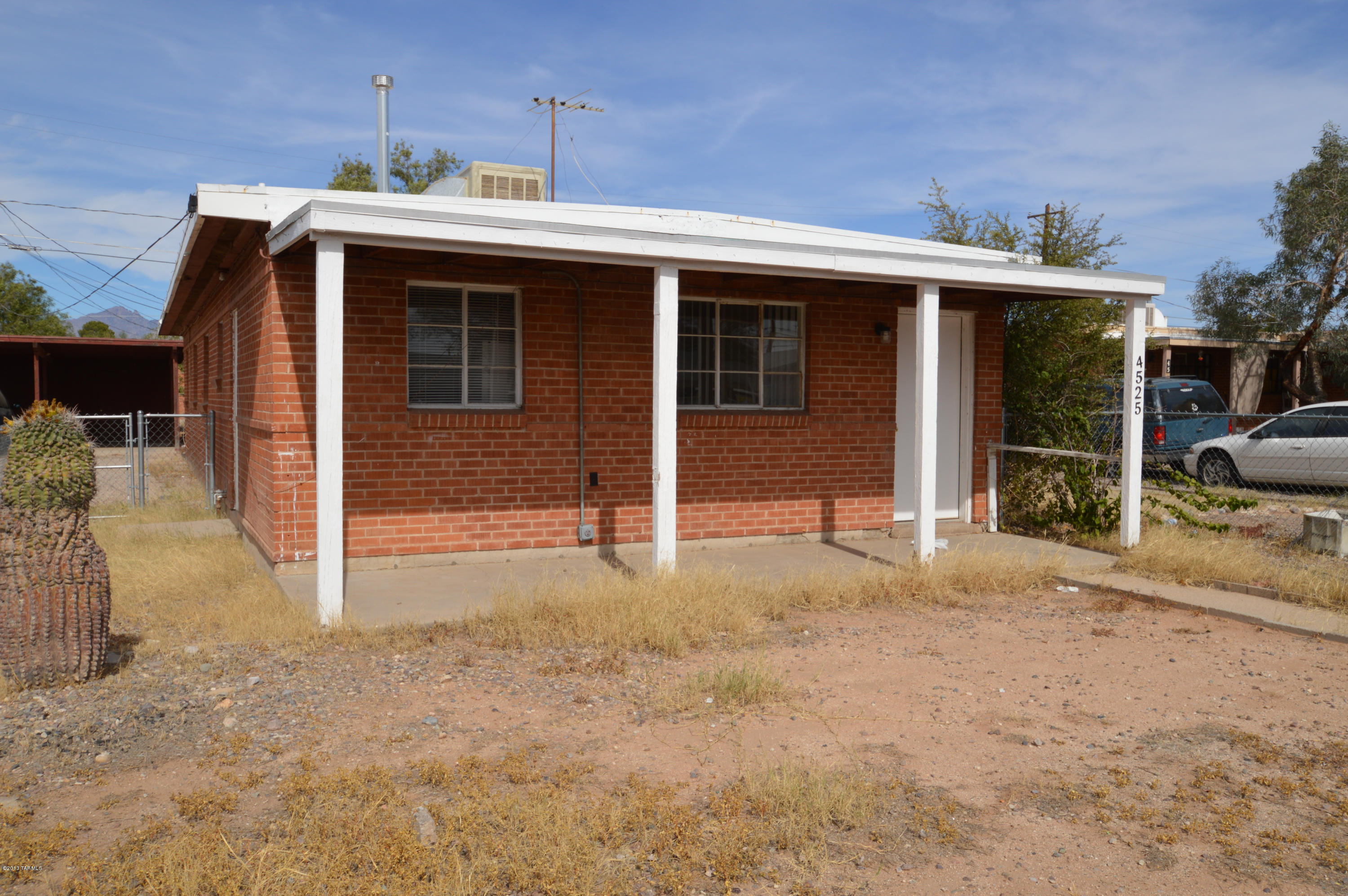 Outstanding value in solid brick 2 bedroom!! Tiled throughout! Spacious living room! Huge covered front porch! Separate carport with additional storage! Great location, easy access to everything. Call NOW, this one won't last long!!