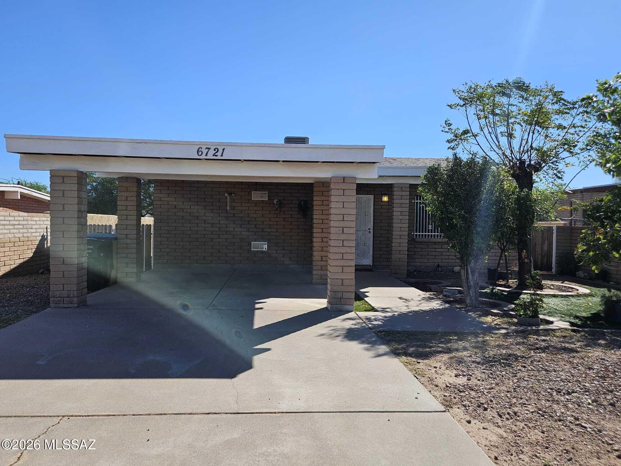 Range priced- seller will accept or counter offers within the range of $220,000-$230,000. This spacious 2-bedroom, 2-bath ranch-style home has a fully fenced yard with a gated front parking near shopping, schools, and dining with access to I-10 and downtown Tucson. MOVE-IN READY