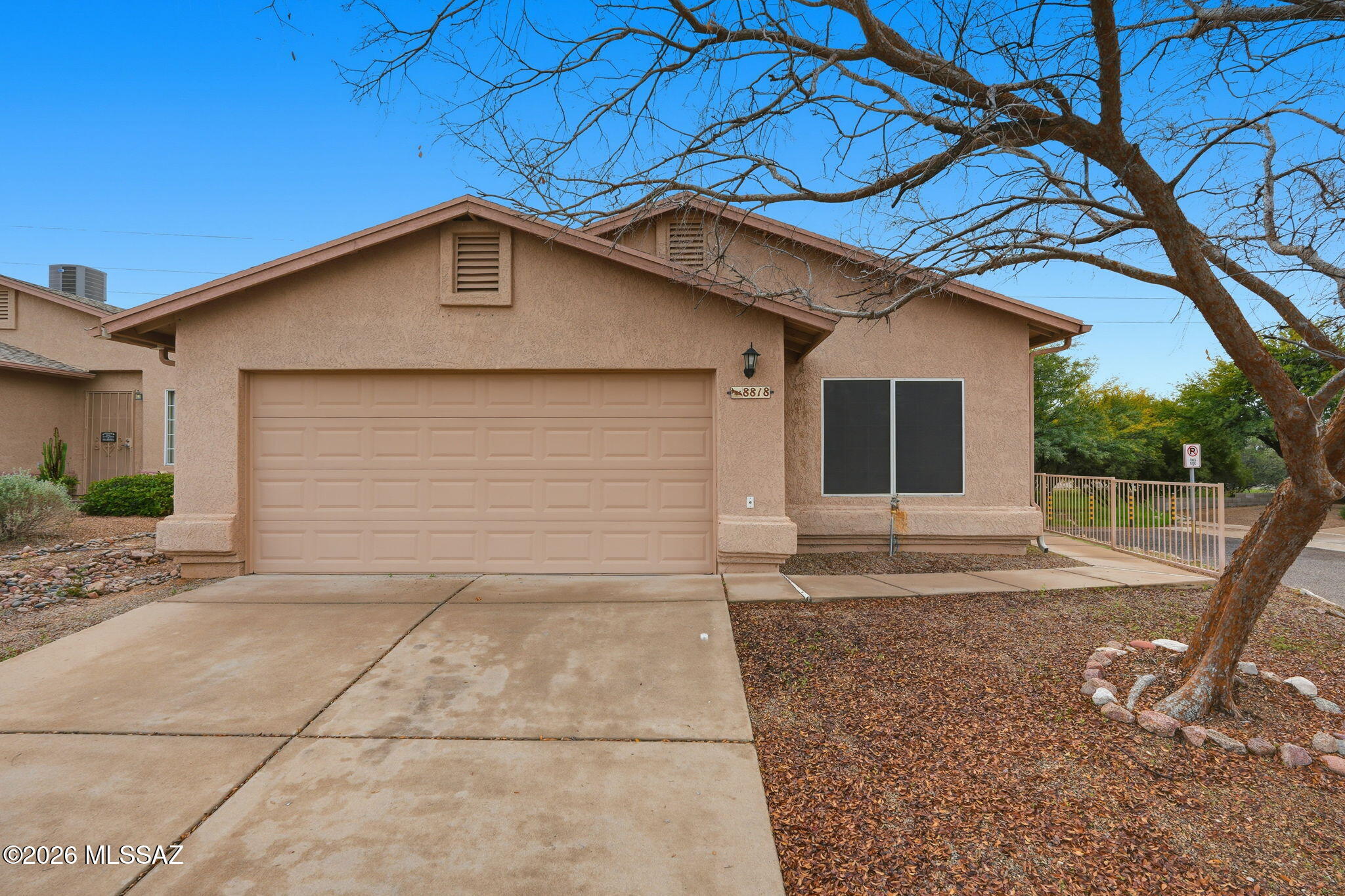 Move-in-ready 4-bedroom, 2-bath home situated on a large corner lot in the desirable Hillcrest at Wingate community. This bright and welcoming home features fresh interior paint and updated flooring in the main living area. The kitchen offers ample cabinet and counter space with convenient pantry storage. The spacious primary suite includes a full ensuite bath and walk-in closet. The generous backyard is a blank slate, ready for your personal touch. Conveniently located near Davis-Monthan AFB, shopping, dining, and Pima Community College East. A great opportunity you don't want to miss!