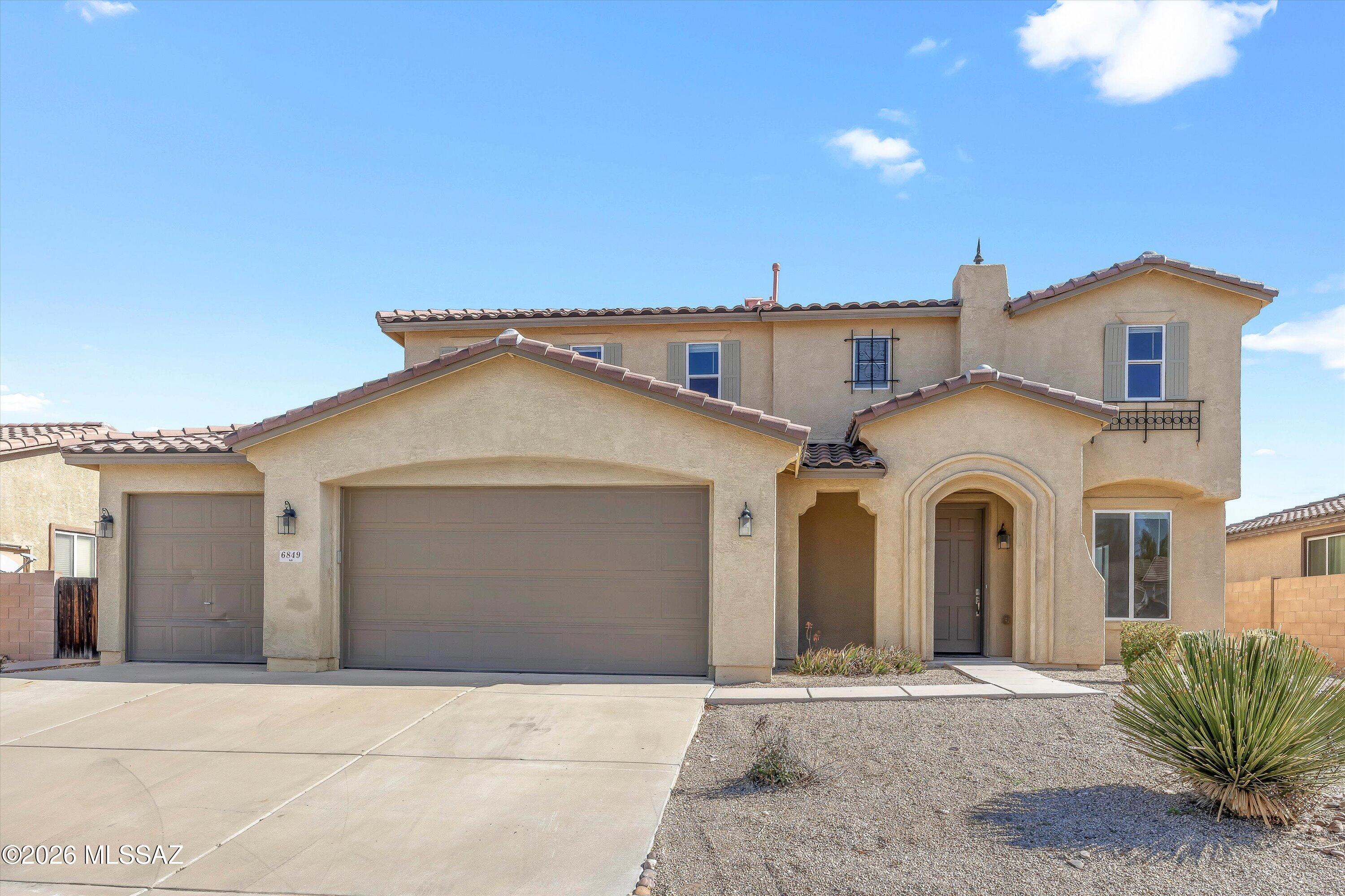 Perfect home for modern family life and entertaining. Welcome to this spacious 3,233 square foot home conveniently located near Tucson International Airport. This generous five-bedroom, three-bathroom residence offers both formal and casual living spaces. The home features a formal living room and dining room for elegant gatherings, while the family room provides a relaxed atmosphere for everyday enjoyment. The heart of the home is the open kitchen with a sunny breakfast area, ideal for casual meals and conversation. With a three-car garage providing ample storage and parking, plus a backyard large enough for a pool, this property offers the perfect Arizona indoor-outdoor lifestyle. Owner is a licensed agent in the state of Arizona. space, functionality, and convenience in a prime Tucson location. Seller is a licensed agent in the state of Arizona.