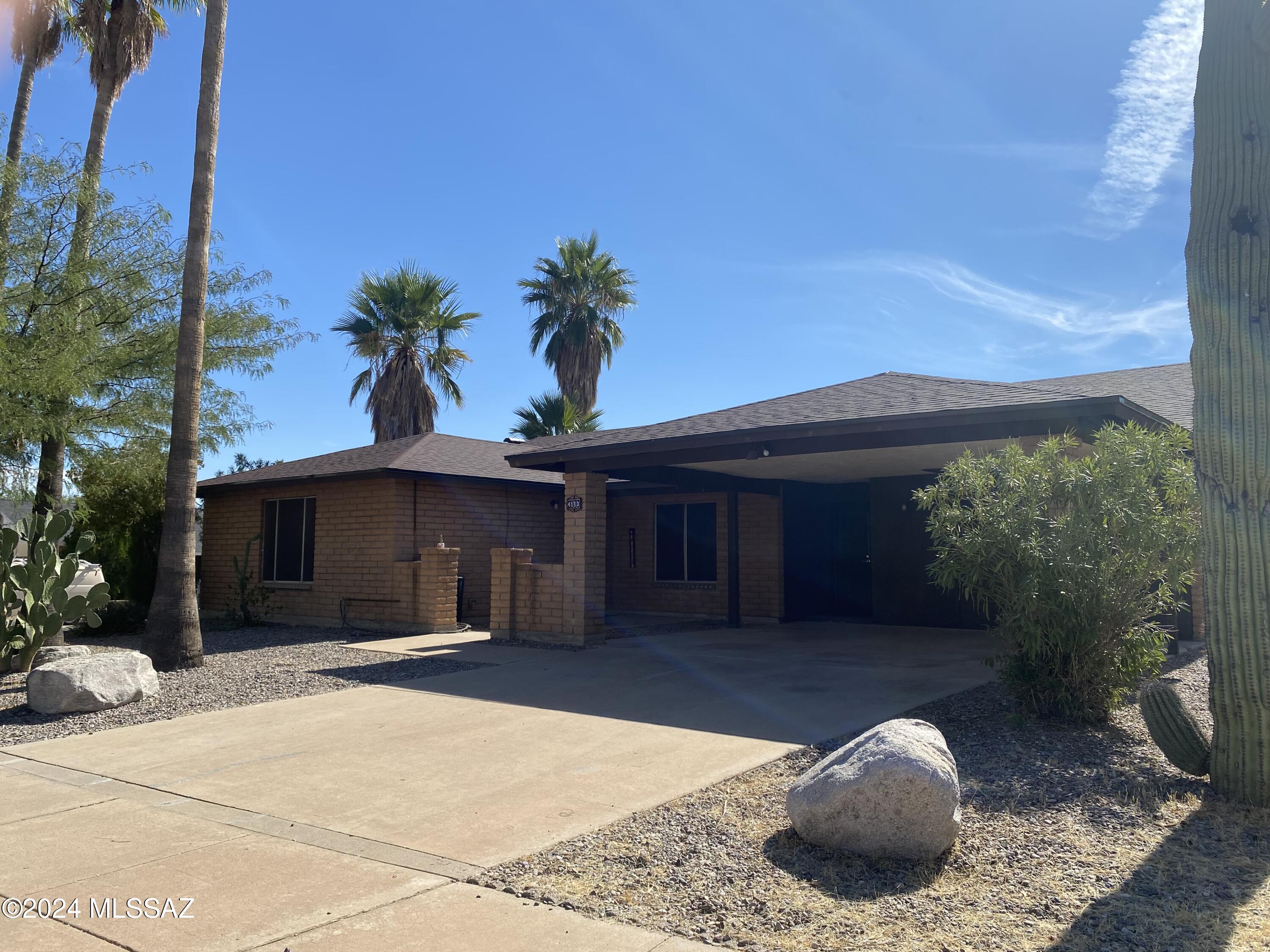 Spacious 4 Br 2 Ba with washer and dryer. All kitchen appliances and large yard. Double carport has extra storage closets. Hard wood flooring and tile throughout! All kitchen appliances. This comfortable home sits on a large corner lot with No HOA 
This one is a MUST SEE ---THEN MOVE IN!