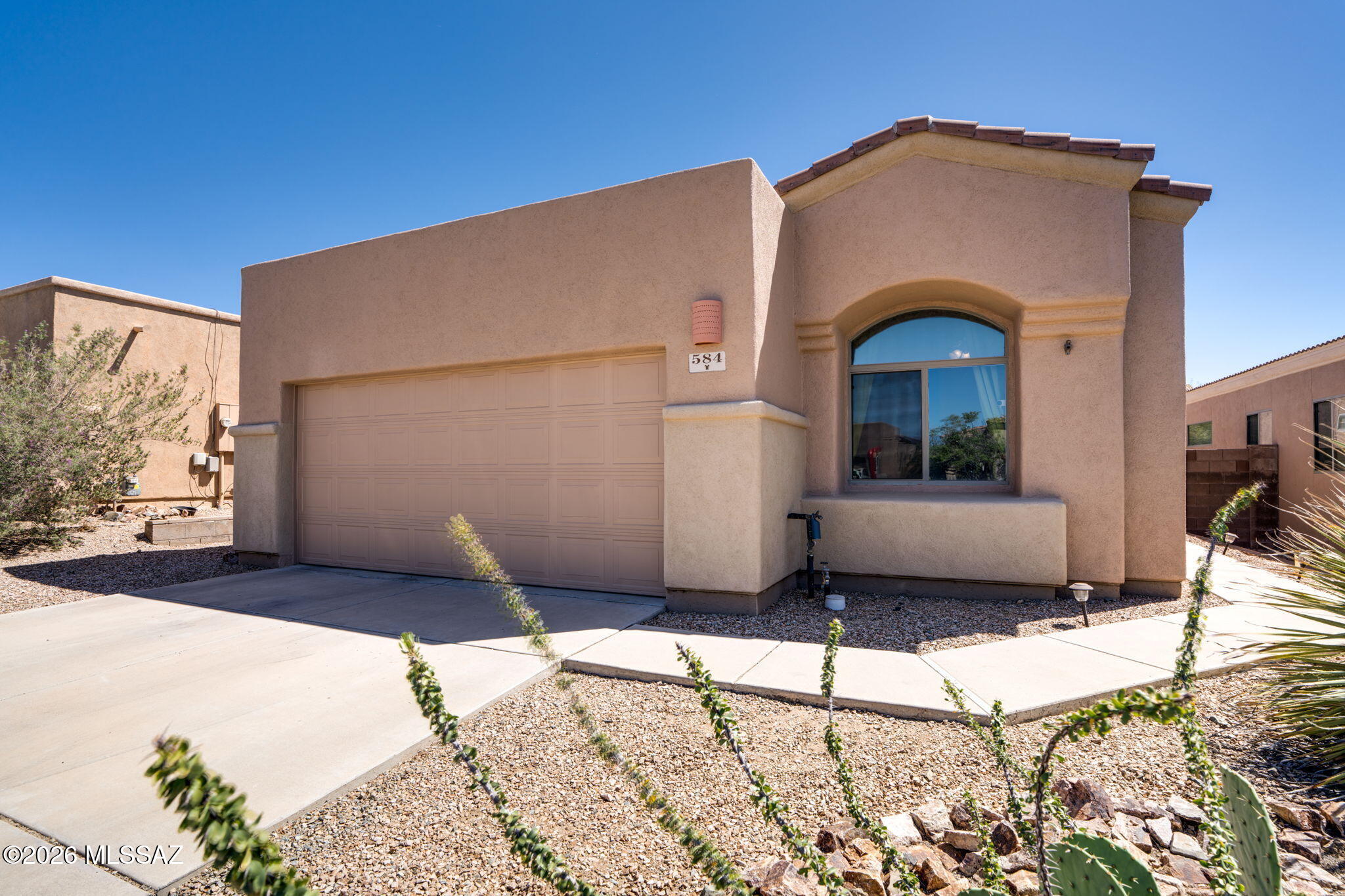 Range Priced from $283,000 to $293,000. Motivated Seller is willing to pay 1 or 2 year home warranty, with an accepted offer. The property is USDA eligible, exterior painted Feb/2025, new garage door opener with camera installed Jan/2026.
This charming 3-bedroom, 2-bath home is located in the desirable Corona de Tucson community and within the highly sought-after Vail Unified School District. Priced under $300,000, this home offers comfort and beautiful desert scenery. Enjoy relaxing evenings on the screened-in back patio and a yard that offers mountain views with no rear neighbors for added privacy. Conveniently located near schools, parks, shopping, and easy access to I-10, this home is perfect for anyone looking to enjoy the beauty and tranquility of Southern Arizona living.