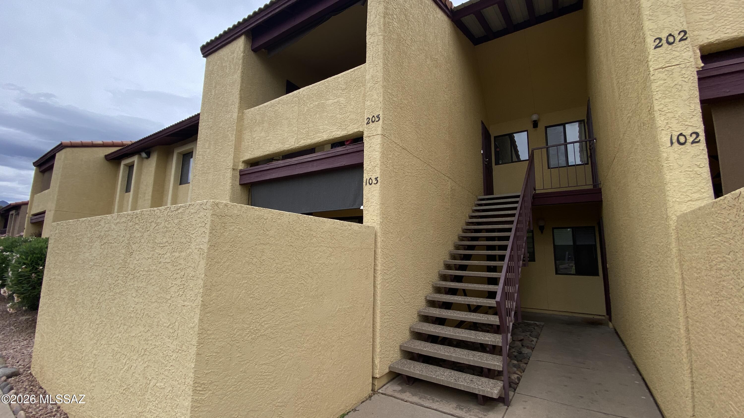 Enjoy this delightful condo located in picturesque Northeast Tucson! This two-bedroom, two-bath condo is move-in ready and cleverly designed to balance practicality and charm in its use of space.  With a seamless kitchen design, a roomy living area, and two generously sized bedrooms, this condo includes two full bathrooms to ensure great convenience for both you and your roommate or visitors. It also comes with in-unit laundry. Situated in a location that offers all the benefits of city living--transit access, shopping centers, medical facilities, and dining options--yet still offers the tranquility of your own northeast retreat. You'll find this property's a great home and a smart investment all in one. HOA fee covers water, sewer, and trash expenses and permits rentals.
