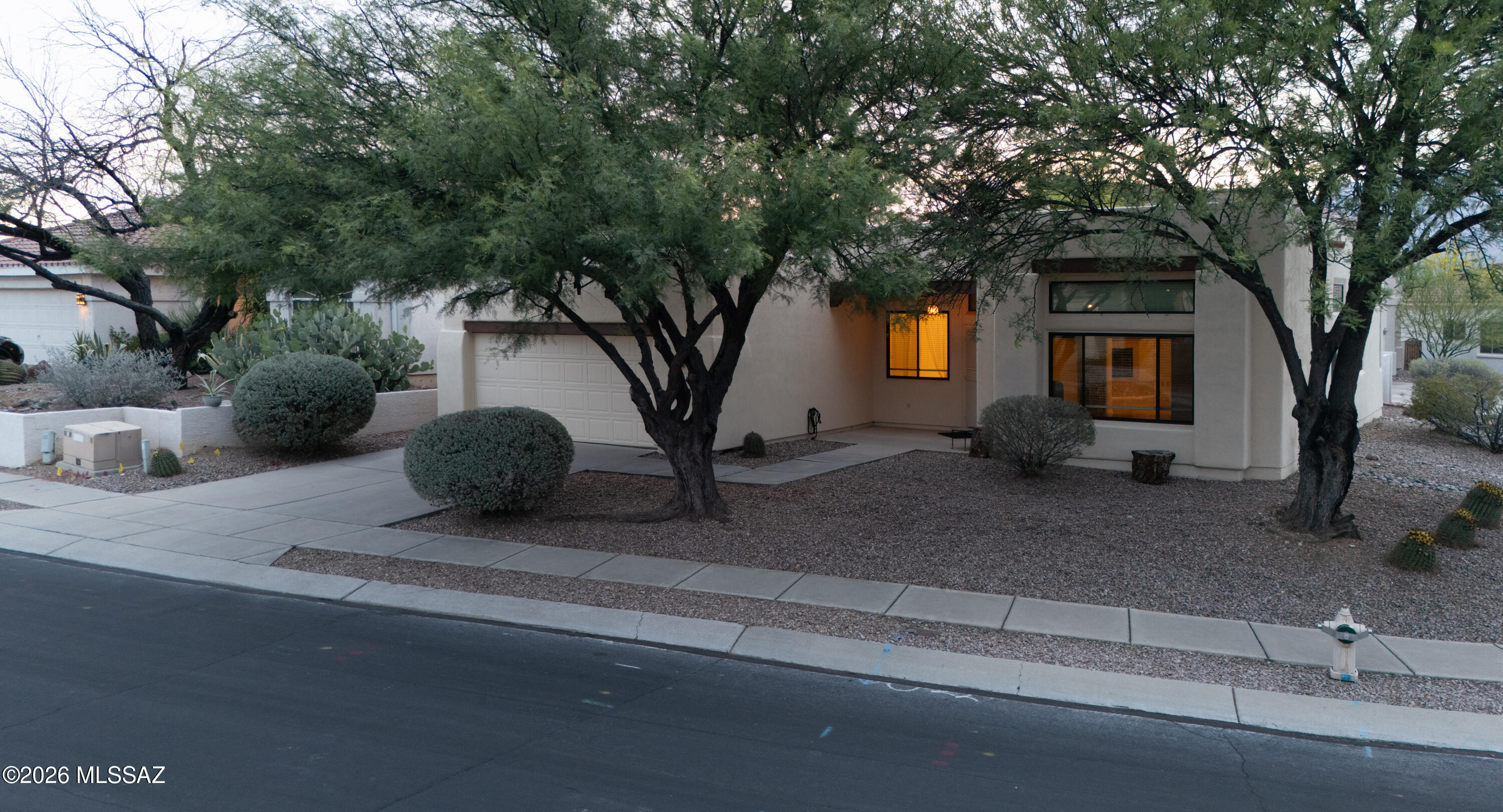 Tucked into a quiet cul-de-sac corner in the heart of Oro Valley, this beautifully updated 3-bedroom plus office, 2-bath home offers the perfect blend of comfort, efficiency, and mountain living.
From the moment you step inside, the thoughtful upgrades are evident -- new windows, fresh exterior paint, Travertine tile, and a host of improvements that make this home truly move-in ready. Energy-conscious buyers will appreciate the owned solar system, paired with a high-efficiency 5-ton condenser and 2-stage gas furnace, keeping utility costs low year-round.
The open kitchen is the heart of the home, featuring granite countertops, a center island, ample cabinetry, and a large pantry -- all anchored by a sun-filled breakfast nook with sweeping mountain views. The adjacent great room invites you to unwind beside a stunning beehive gas fireplace, while a separate living and dining area gives you the flexibility to entertain with ease.
The spacious owner's suite is a true retreat, complete with a luxurious bath. The office/fourth bedroom offers the ultimate flexibility. Outside, the generous, private backyard features both covered and open-air patios -- ideal for morning coffee or evening gatherings with those signature Oro Valley mountain views as your backdrop.
Additional peace of mind comes with the confirmation of no polybutylene pipes. 
Ideally situated near top-rated schools, medical facilities, dining, shopping, and miles of walking trails and parks -- this one checks every box. Don't miss it.