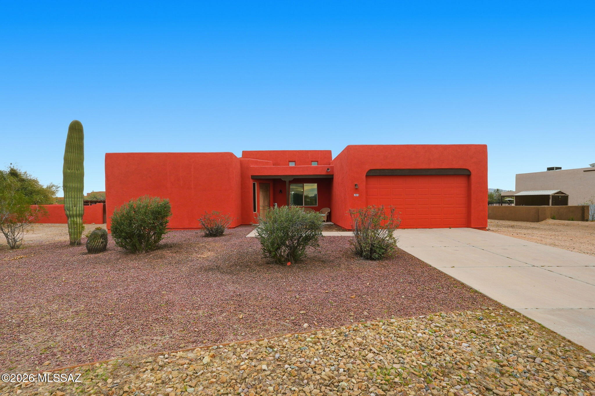 A comfortable split bedroom HOME design with a blend of Southwest charm and style.  The kitchen design is the heart of the home with a spacious breakfast bar.  To add to the charm is a Kiva FP located in the family room.  All of this is enhanced by clerestory windows embracing natural lighting.  A leased Solar Panel System offering energy efficiency.  An expansive 0.92-acre lot, completely walled with a large private back yard with shed and double gate.