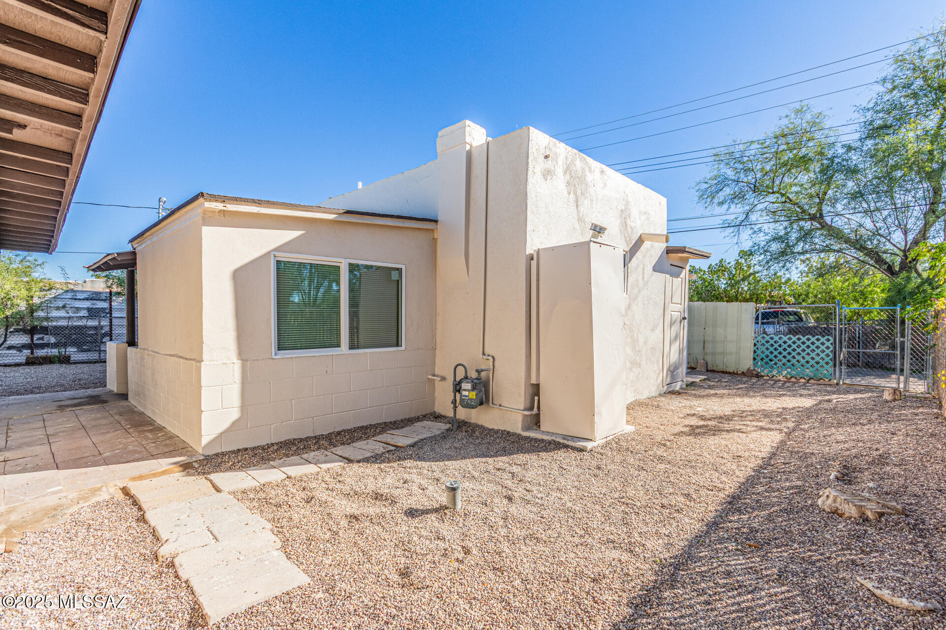 Beautifully updated 2BD/1BA home with a 302 sq ft studio suite in Southern Heights. Main home offers new electrical wiring, new lighting, fans with remotes, updated kitchen with new Formica counters and hardware, electric stove, and dishwasher to be installed before closing. New tile throughout, updated bath with tiled shower, and freshly painted interior/exterior. Studio includes mini split, half bath, and W/D hookups. Property features new windows, doors, locks, baseboards, blinds, 3 new mini splits, freshly sealed roof, new Deco rock, carport, full fencing, and a large yard. Owner/Agent