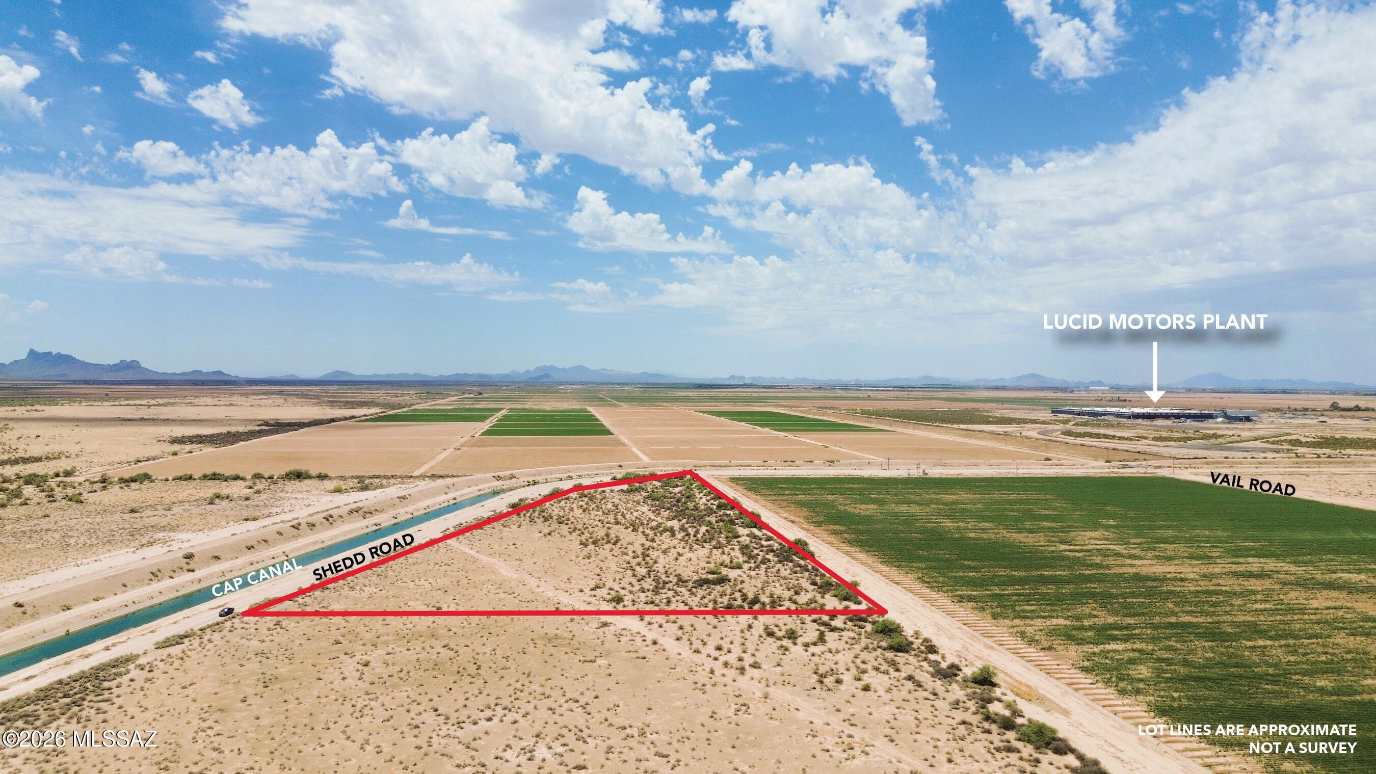 CAP Canal Frontage! ±10.6 Acres - Prime Investment & Development Opportunity Rare opportunity to own approximately 10.6 acres with frontage along the Central Arizona Project (CAP) Canal in one of Arizona's fastest-growing corridors. Ideally located between Eloy, Coolidge, and Casa Grande, this flat, buildable corner parcel offers outstanding long-term investment potential with convenient access to Highway 87, Interstate 10, and major transportation routes. Is designated for Industrial use in the Coolidge General Plan. Less than a mile from Highway 87 and is located near the Lucid Motors manufacturing facility and future Procter & Gamble's manufacturing plant, placing it in the heart of an expanding employment and industrial corridor. It also lies within the planned route of a proposed fwy bypass to Coolidge. Creating excellent future upside through potential annexation and rezoning. Buyers should verify all future land use and development potential. Currently located in unincorporated Pinal County and zoned GR (General Rural), the property offers immediate flexibility for residential or agricultural uses while providing excellent long-term investment potential. GR zoning allows site-built homes, manufactured homes, agricultural activities, livestock, horses, and a variety of other rural uses. Ask the broker for a complete list of permitted uses and zoning information. The parcel enjoys good dirt road frontage on Shedd Road with access from Vail Road  a second dirt road, providing excellent accessibility. Electrical service, including ED2 power, is nearby, with power located approximately 150 yards from the property. The land is level, naturally vegetated, and offers wide-open desert views with no HOA. Whether you're looking to build a custom home, establish a rural retreat, develop an agricultural operation, or secure property in the direct path of Arizona's continued industrial and residential growth, this parcel offers exceptional value. Owner may carry financing. Offered at only $300,000! Contact the broker for maps, zoning information, and property details.