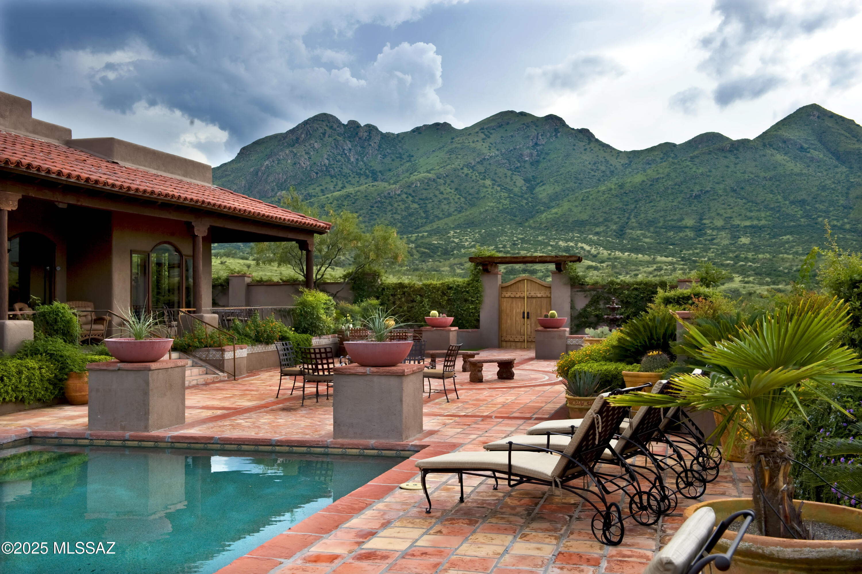 This extraordinary 1076.71-acre property showcasing premium improvements at every turn. The ranch features a stunning main residence, a versatile guest house that doubles as an office or conference space, and a full complement of ranch facilities—including a hay barn, tack room, shop, stables, pens, two  ramadas, and a spacious 72-acre fenced horse pasture. The property borders the Sonoita State park comprising thousands of acres of preservation land and providing additional privacy to the ranch. In addition, the owners have access to the adjoining Salero Ranch which provides thousands of acres of additional riding opportunities. SEE MORE Every structure and feature on the property has been meticulously cared for and remains in exceptional condition! Situated at a comfortable 4,000-foot elevation, the ranch enjoys lovely climate, breathtaking panoramic views, and unlike much of Arizona's rugged landscape, this property offers wide stretches of soft, non-rocky ground, making it ideal for horseback riding. Whether you're taking a quiet morning ride or exploring the open spaces at sunset, the land provides a comfortable, natural environment for both horses and riders. Fully Furnished homes all while being just a short, convenient drive from the charming town of Tubac. Saddle up and explore your own scenic acreage with ease.