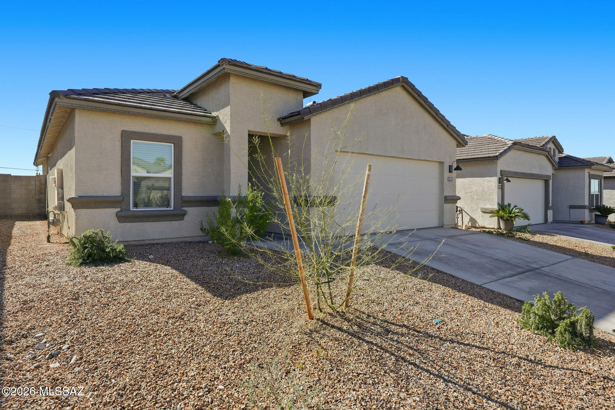 This like-new DR Horton 4-bedroom, 2-bath home sits on a huge lot and offers a rare opportunity to assume a fantastic low-interest mortgage—a major advantage in today's market.
The open-concept layout features a bright living area and a modern kitchen with a large island, beautiful quartz countertops, stainless-style finishes, and a walk-in pantry—perfect for entertaining or everyday living. The split bedroom floor plan provides privacy, with a spacious primary suite and comfortable secondary bedrooms.
Step outside to a covered patio overlooking the expansive yard, ideal for outdoor dining, play space, or future upgrades. This home is move-in ready, energy-efficient, and built with the quality DR Horton is known for.
Homes with assumable financing, modern finishes, and large lots ar