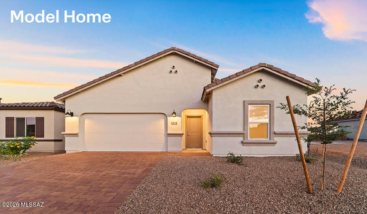 This home is under construction now, and will be ready approximately March/April of 2026! Stop by to see our brand new model home of this gorgeous plan today!
Introducing the York — a thoughtfully designed new floor plan at Solterra by D.R. Horton in Green Valley. Offering 1,863 square feet of well-planned living space, the York is ideal for those seeking a home that balances comfort, flexibility, and modern design. Step inside through the welcoming entryway and experience an open-concept layout that maximizes every square foot. The expansive great room serves as the heart of the home, flowing seamlessly into the dining area and kitchen—perfect for both everyday living and entertaining. The kitchen features a spacious center island, quartz countertops, Shaker-style cabinetry, and a dedicated pantry, delivering a clean, modern aesthetic with ample storage for all your culinary essentials. 
The York is available in two- and three-bedroom configurations, offering versatility to suit a variety of lifestyles. The primary suite is thoughtfully positioned at the rear of the home for added privacy and includes a walk-in closet and a well-appointed en-suite bathroom. Near the front of the home, a guest bedroom with ensuite full bath, and study at the center of the home across from the ½ bath creates a functional and flexible layout for guests, work-from-home needs, or additional living space.
Designed with both comfort and practicality in mind, the York includes a utility room conveniently located near the kitchen and garage, providing easy access to the laundry area and additional storage. A covered back patio extends the living space outdoorsideal for relaxing and enjoying Green Valley's beautiful year-round weather.
Homes at Solterra feature elegant, modern interiors paired with distinctive exterior details, including Sand Finish Texture stucco, landscaped front yards with auto drip irrigation, and fully fenced backyards. Covered front porches and back patios offer inviting spaces to unwind and take in Green Valley's breathtaking sunsets. Inside, D.R. Horton's Home is Connected® Smart Home package enhances everyday living with a smart thermostat, video doorbell, keyless entry, and a Wi-Fi-enabled garage door opener.
Outdoor enthusiasts will appreciate the close proximity to scenic neighborhood parks, Colossal Cave Mountain Park, and an extensive network of golf courses, walking and biking trails throughout Green Valleymaking the York a perfect blend of comfort, style, and lifestyle-driven design.
