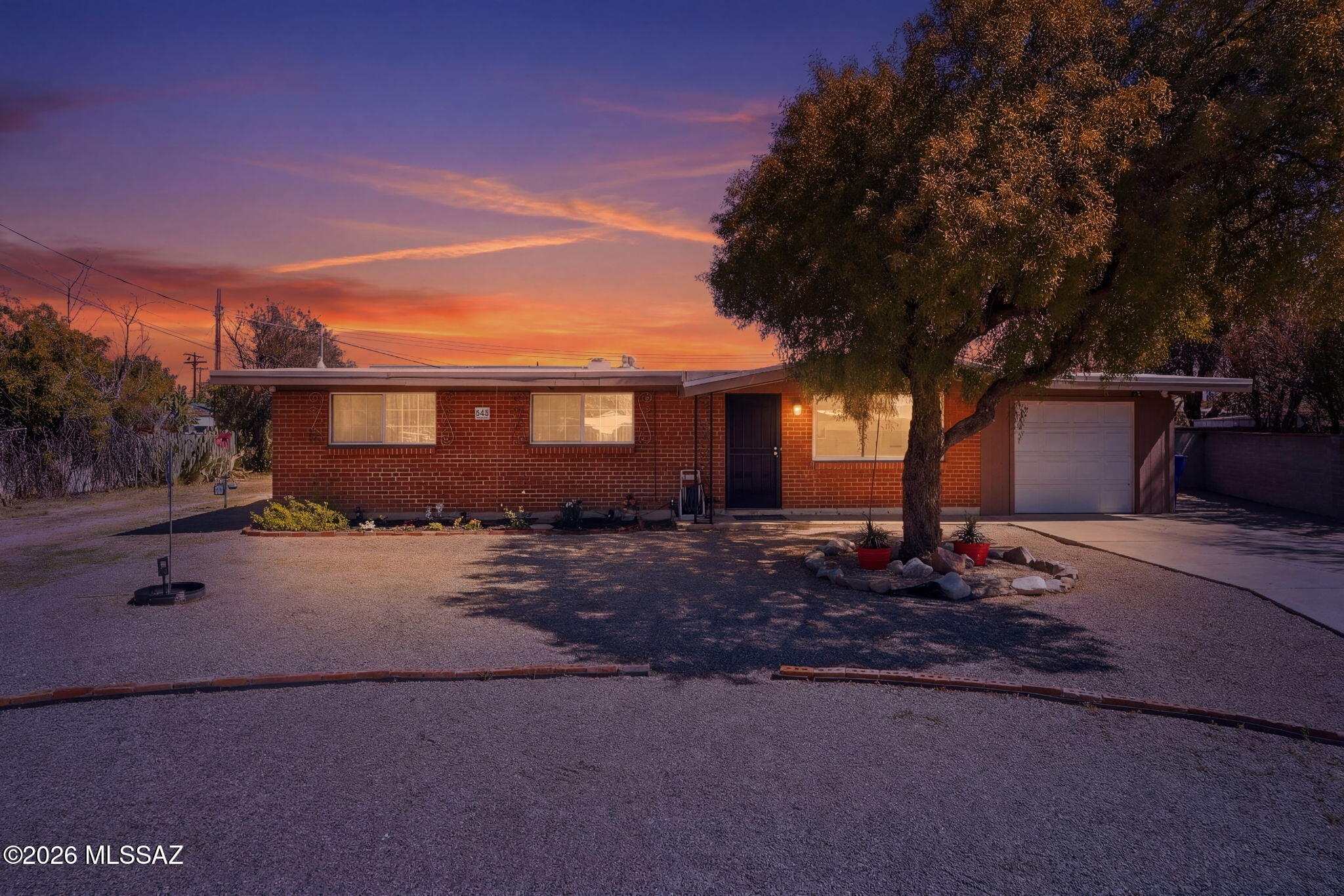 Range Priced $325K - $335K. Located on a relaxing and private Cul-De-Sac with NO HOA and a garage (a rare combo), you're going to love this beautiful home in a well established neighborhood. This home was taken down to its studs in 2020 and fully updated. New roof, flooring, electrical, windows - including a gorgeous Renewal By Anderson Picture Window - new paint, kitchen with soft close cabinets and drawers, appliances, a BRAND NEW HVAC system installed in 2026, and more. With one of the biggest lots in the neighborhood, you will have plenty of space for your RV, trailers, toys, etc. The large east facing backyard is shaded all afternoon and is ready for entertaining. Just minutes away from the U of A, Banner, TMC, Park Place Mall, and tons of restaurants. Come see it for yourself!