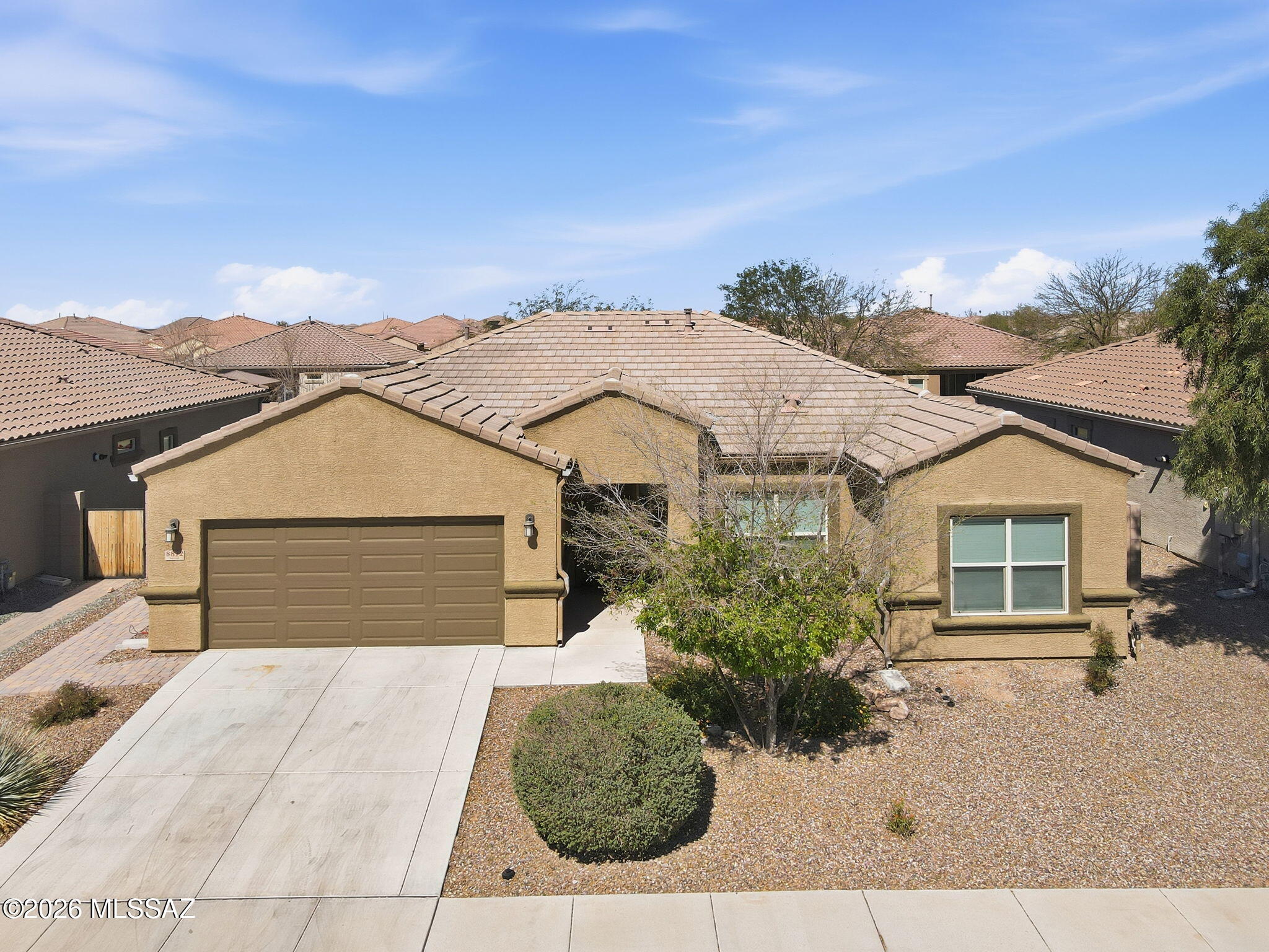 Located in the gated & desirable 55+ community of Freedom at Saguaro Bloom, this beautifully maintained 3-bedroom, 2-bath split-bedroom plan is truly move-in ready. The comfortable, functional floor plan is ideal for everyday living & entertaining. The spacious backyard is a standout feature & ready for your design! There's plenty of room to relax or entertain. With no common backyard wall, you'll enjoy an added sense of privacy and openness that buyers consistently value.  Enjoy the vibrant, active adult lifestyle Freedom at Saguaro Bloom is known for with its resort-style amenities & a welcoming community atmosphere. Residents enjoy all community amenities, including pools, a workout room, pickleball, and miles of trails and walking paths.Don't wait! Call today for your private showing!