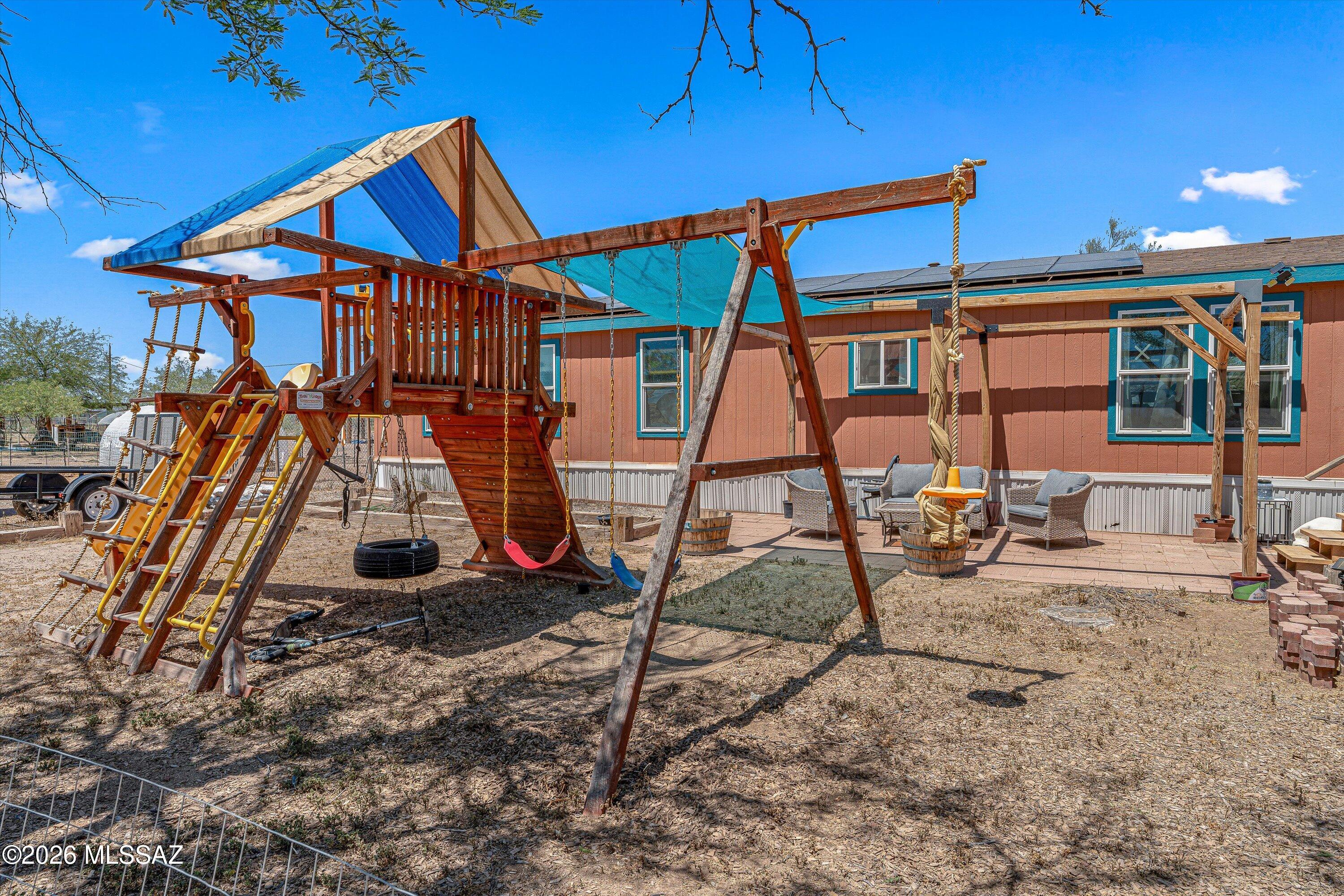 MOTIVATED SELLER!  Enjoy spacious rural living in this 3-bedroom, 3-bath, 1-acre home with stunning mountain views and no rear neighbors for added privacy. This spacious property features owned solar for energy efficiency and long-term savings. A large circular driveway provides ample parking and easy access, perfect for guests, RVs, or multiple vehicles. The outdoor space includes fenced areas ideal for animals, hobby farming, chickens, or pets, plus a convenient space for an RV (and RV clean-out). With room to roam and upgraded interior features (such as honeycomb kitchen blacksplash), this property offers the perfect blend of comfort, functionality, and scenic surroundings. Don't miss this unique opportunity!